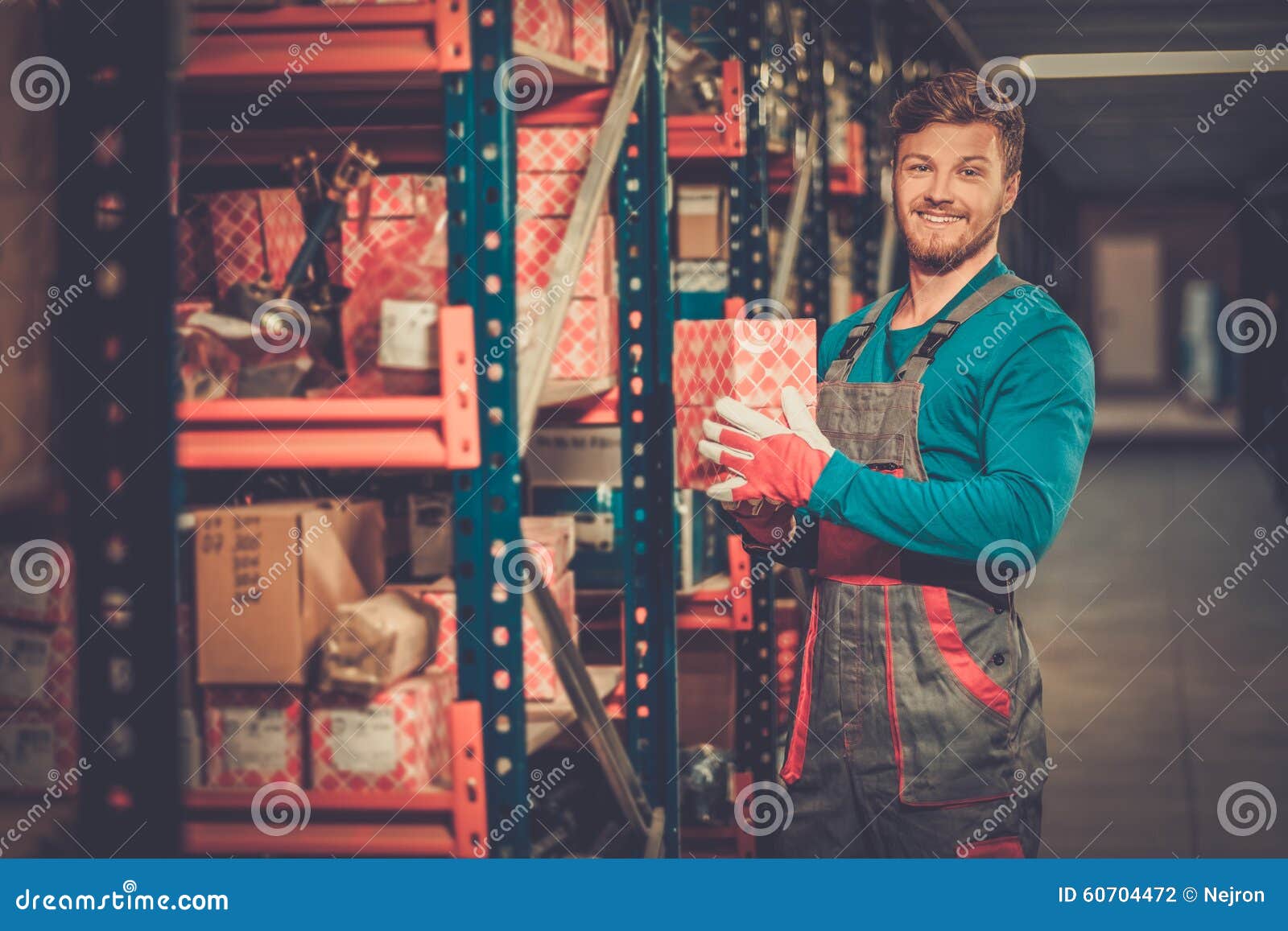 Worker in a Spare Parts Warehouse Stock Photo Image of people