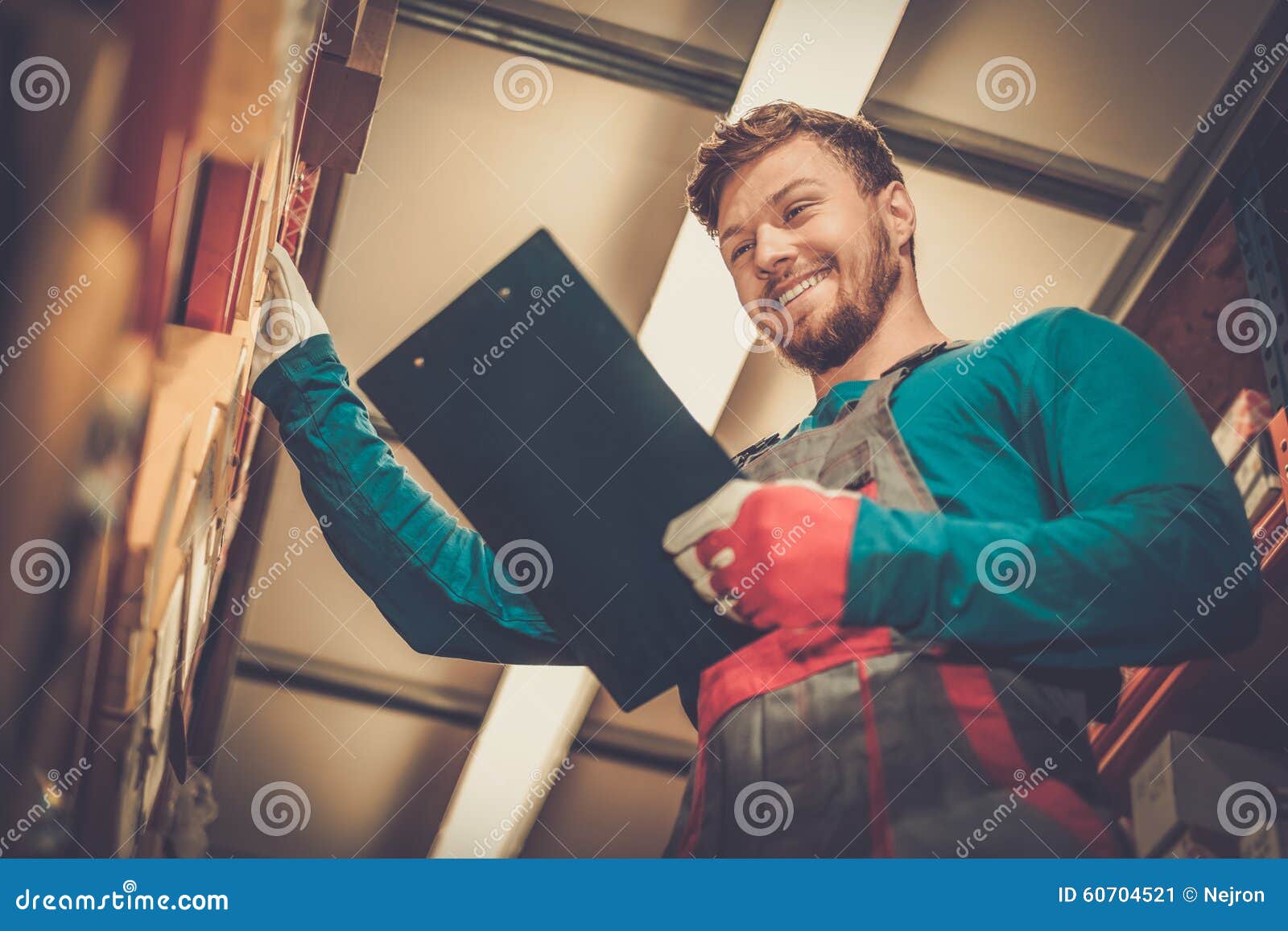 Worker in a Spare Parts Warehouse Stock Image Image of parts, shelves