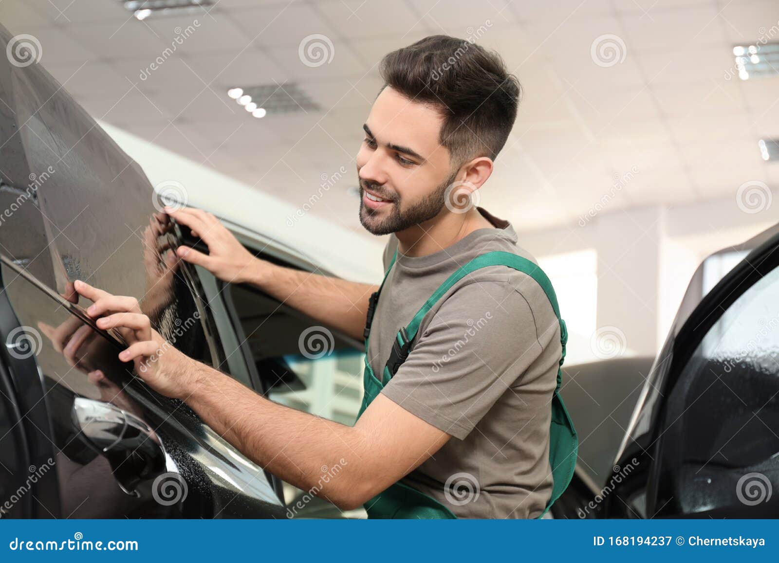 Worker Tinting Car Window with Foil in Stock Image Image of caucasian, black 168194237