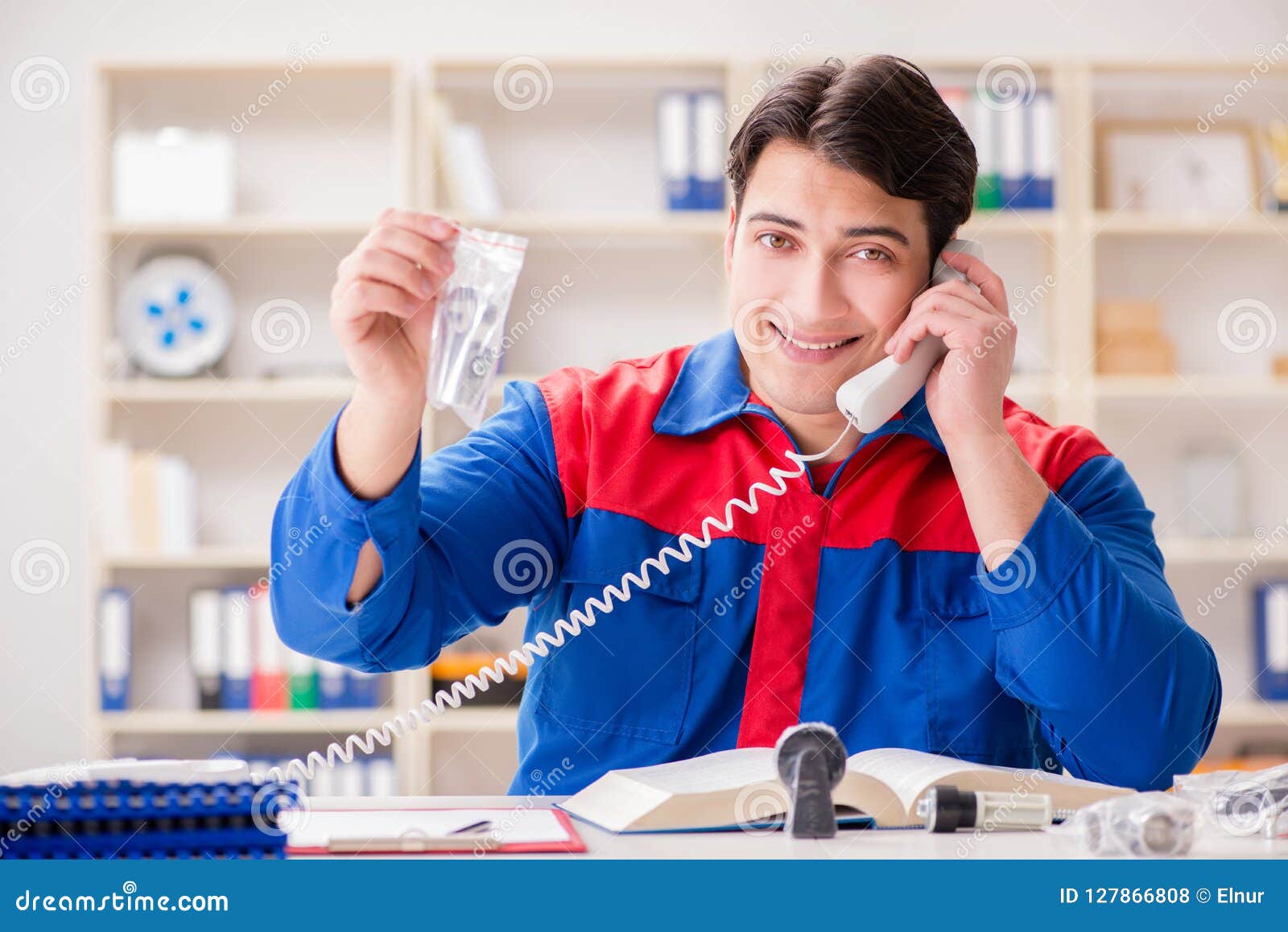 The Worker in Uniform Working on Project Stock Photo Image of gear