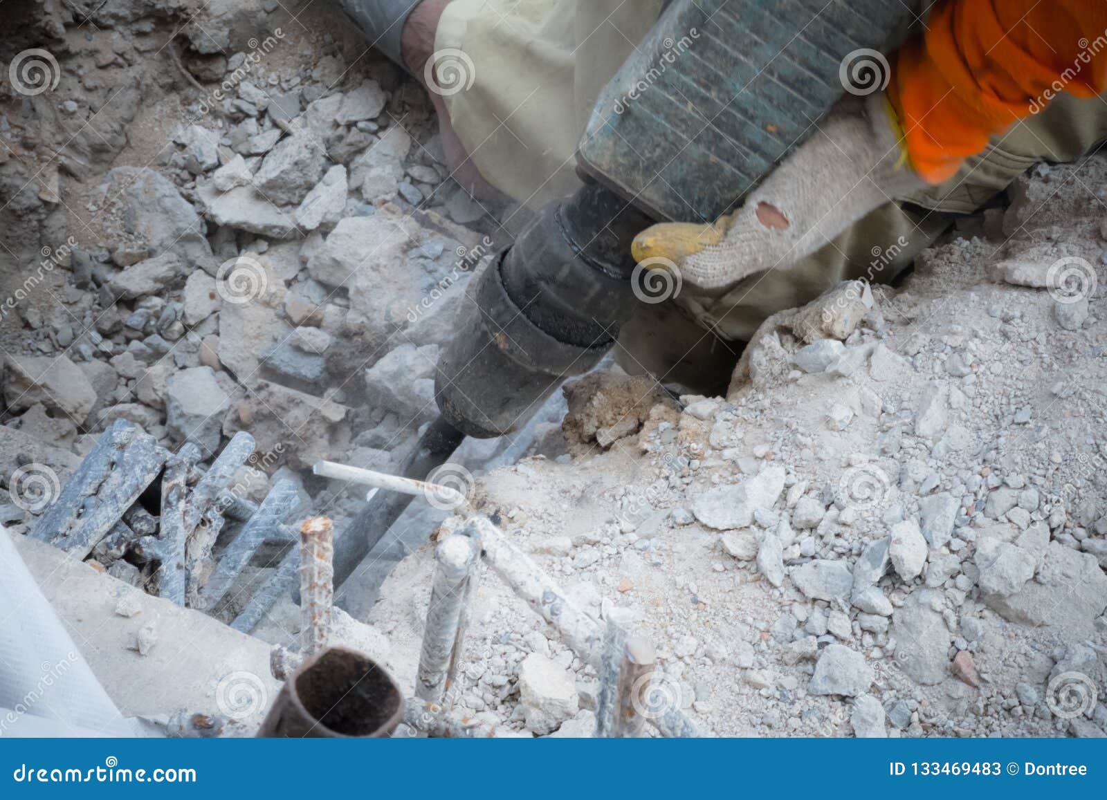 Worker Use Demolish Tool for Concrete Surface Stock Image - Image of