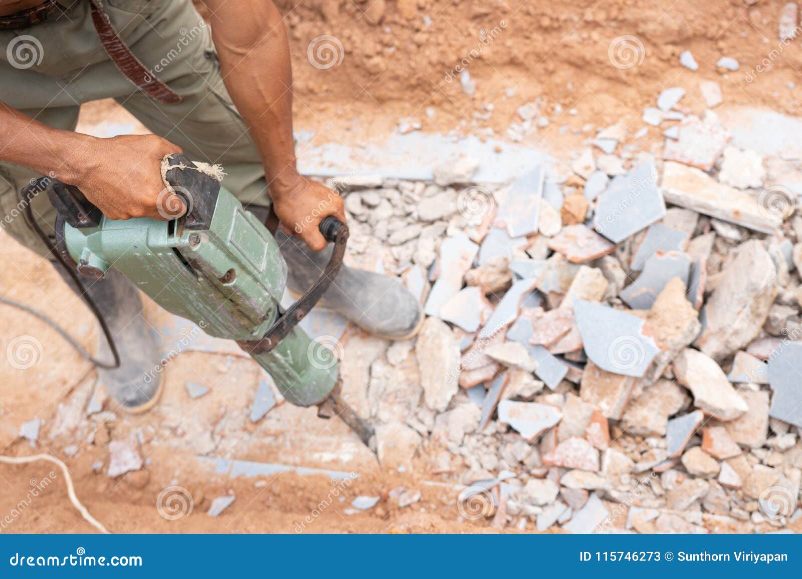 Worker Using Concrete Extractor Machine To Destroy Concrete Stock Image