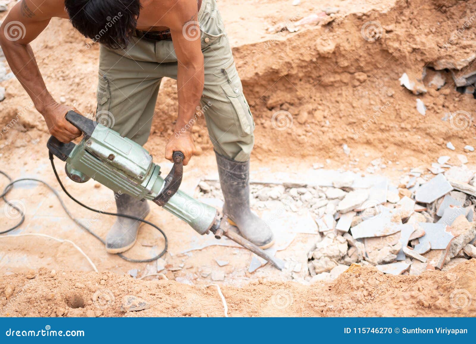 Worker Using Concrete Extractor Machine To Destroy Concrete Stock Photo