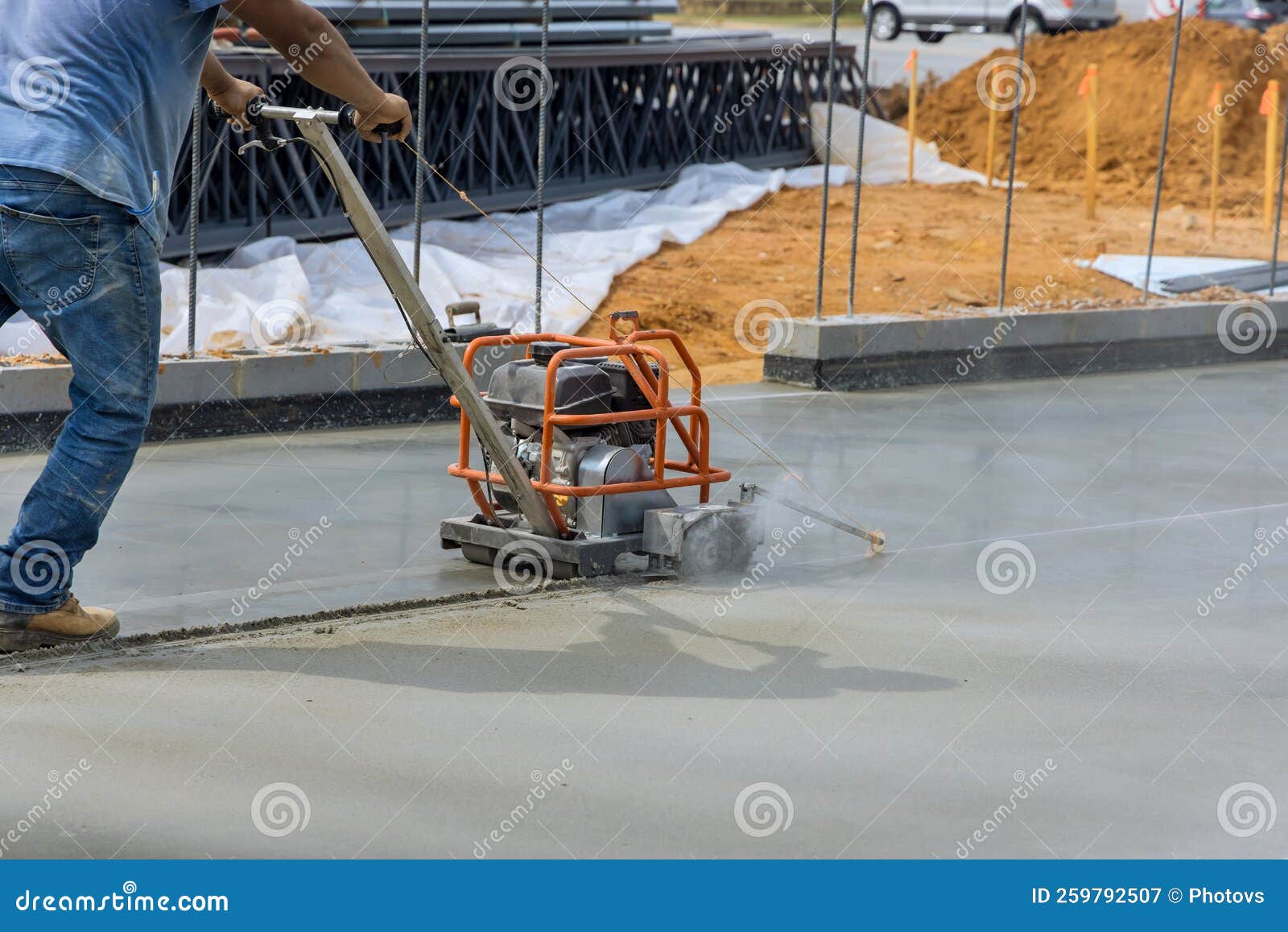 Worker Using Cutting Machine are Cutting Concrete for Expansion Isolation Joint of Foundation