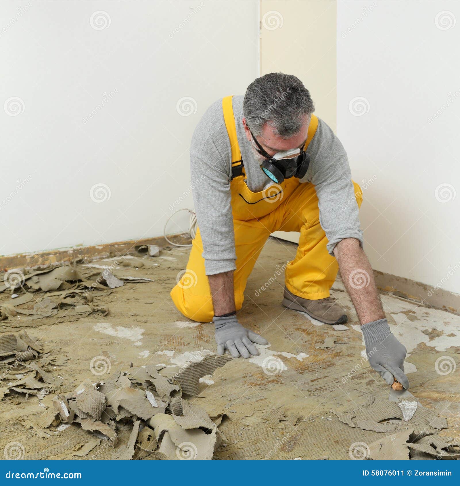 Worker Using Putty Knife for Cleaning Floor Stock Image Image of glue