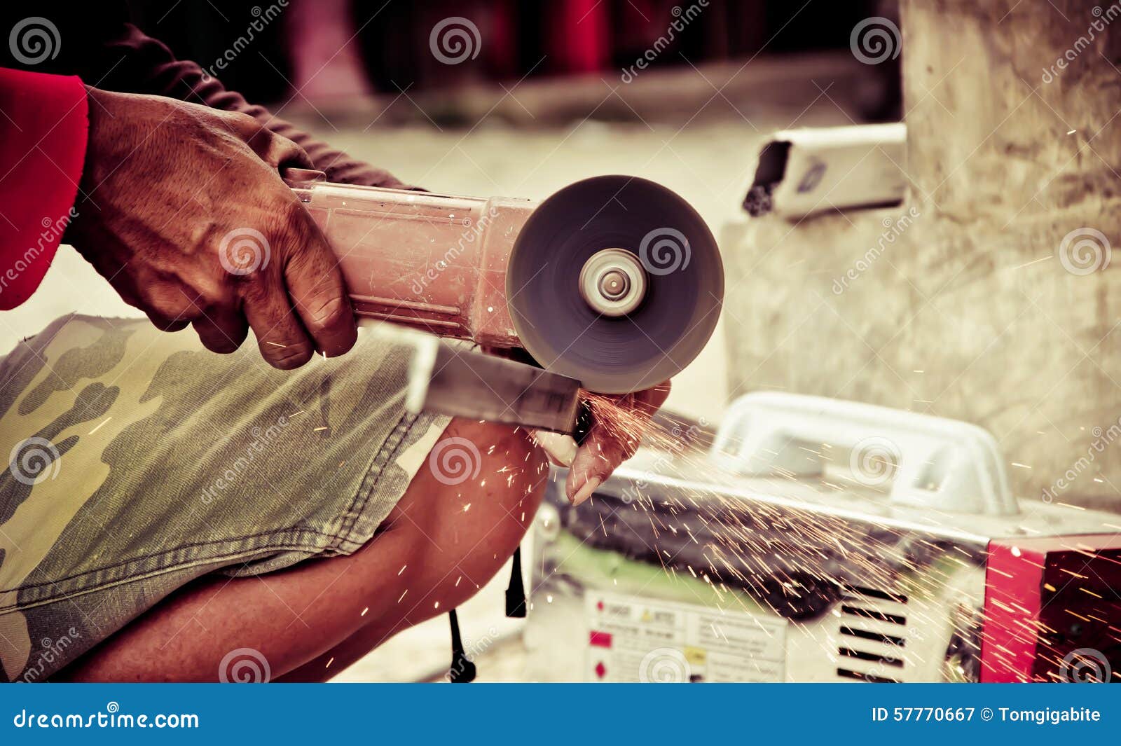 Worker Using a Small Grinder for Cutting Metal Stock Image Image of