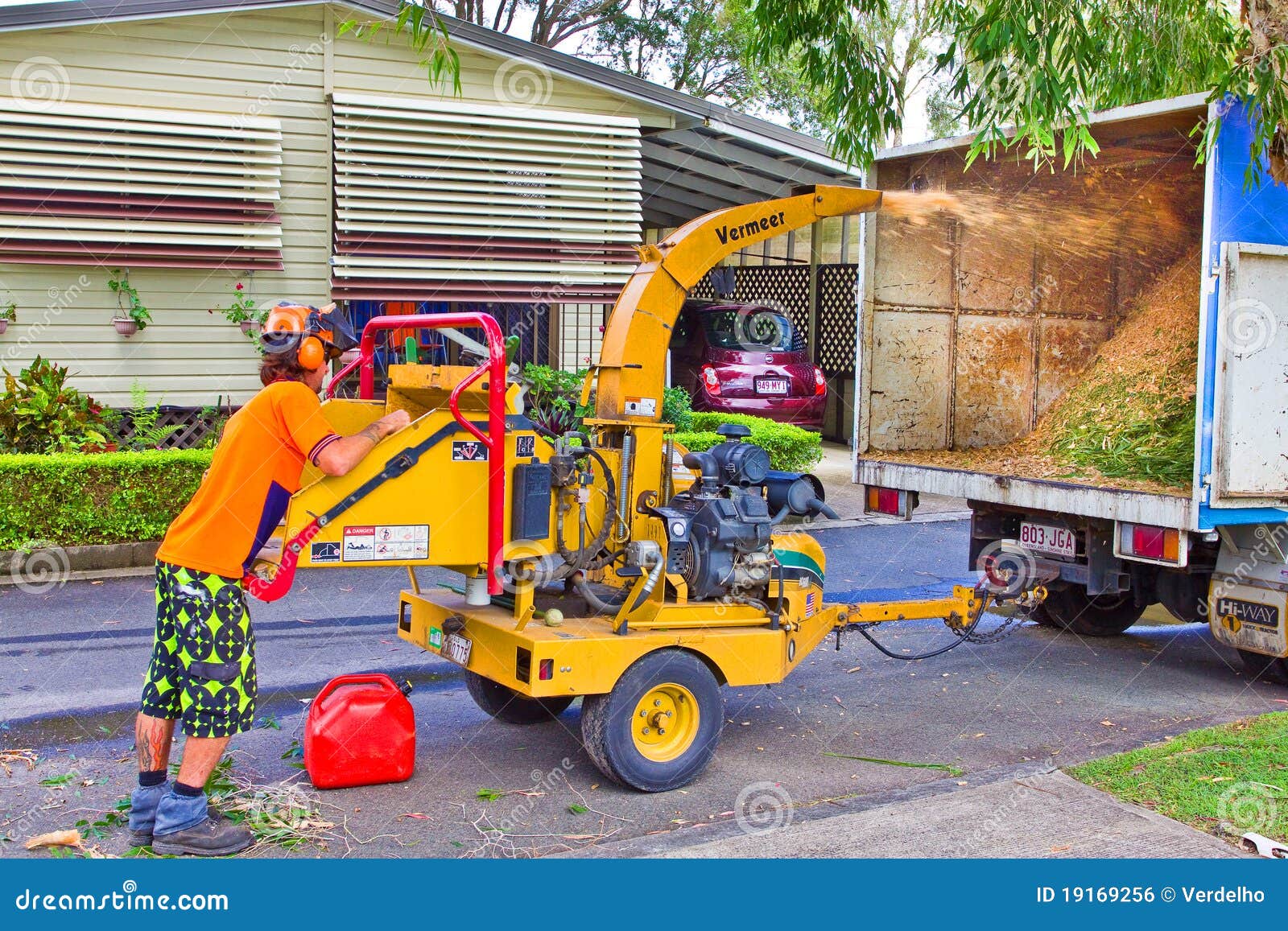 Worker Using Wood Chipping Machine Editorial Photo Image of shredder