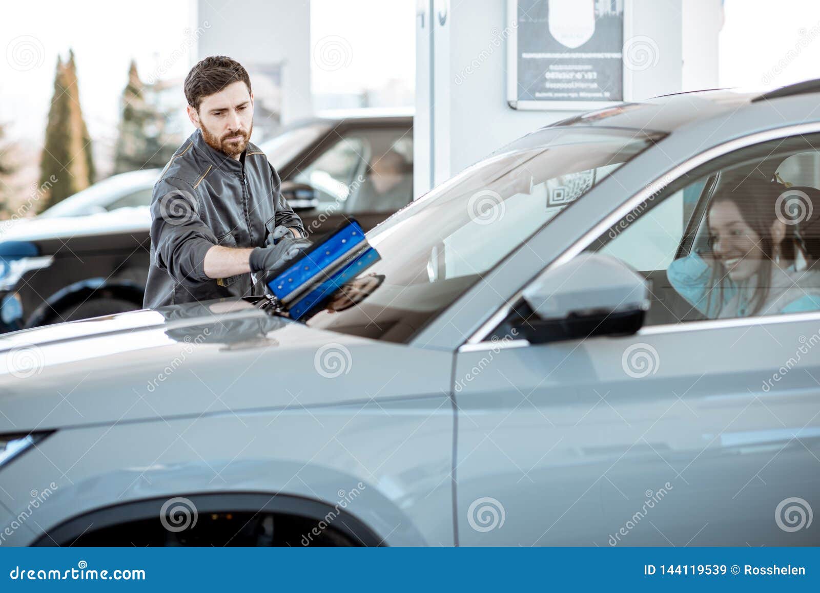 Worker Washing Car Windshield at the Station Stock Image Image of