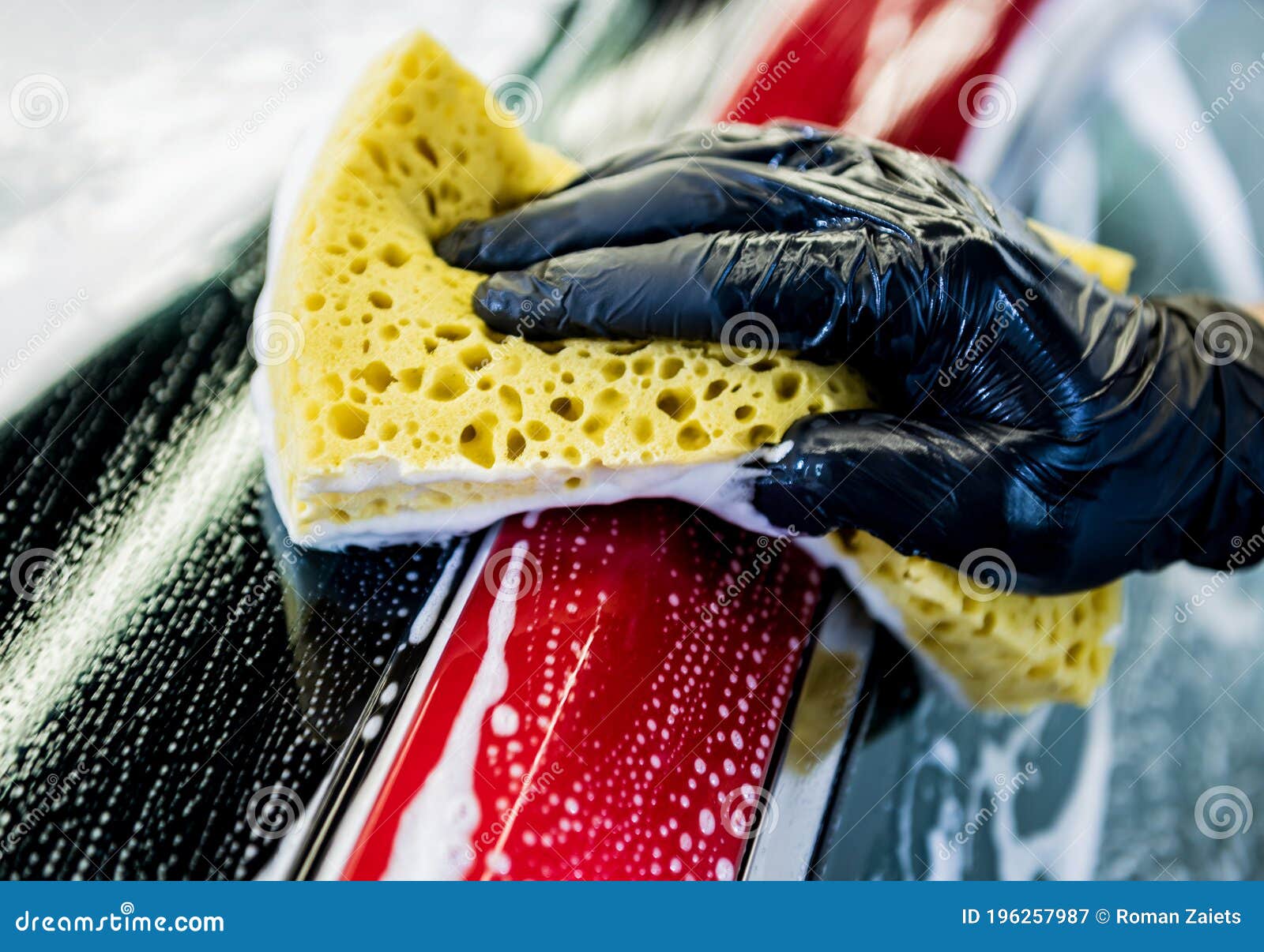 Worker Washing Red Car with Sponge on a Car Wash Stock Image Image of