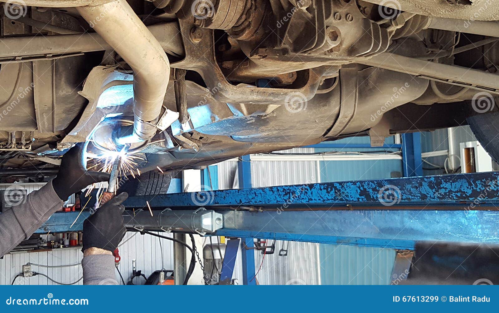 Worker Welding Metal Exhaust Pipe Stock Image Image of metalwork