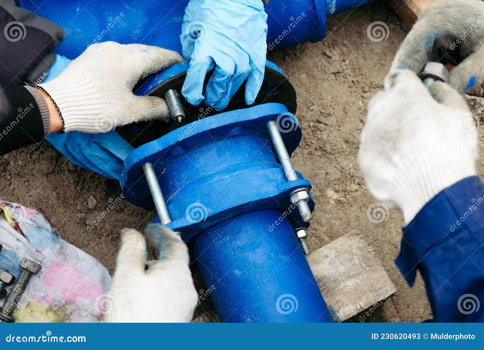 Workers Installing Water Supply Pipeline System, Close Up Stock Image Image of close