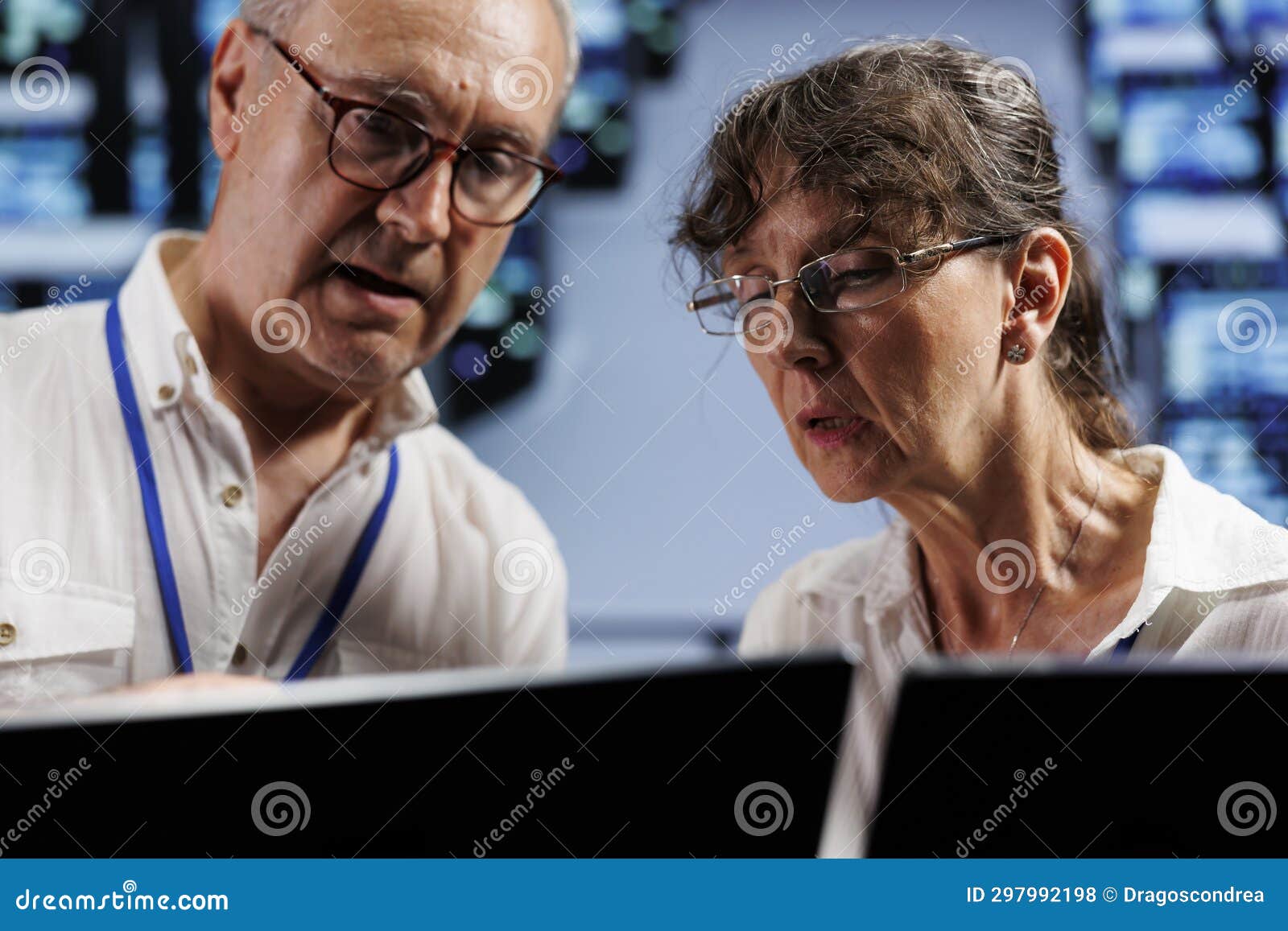 workers monitoring rackmounts