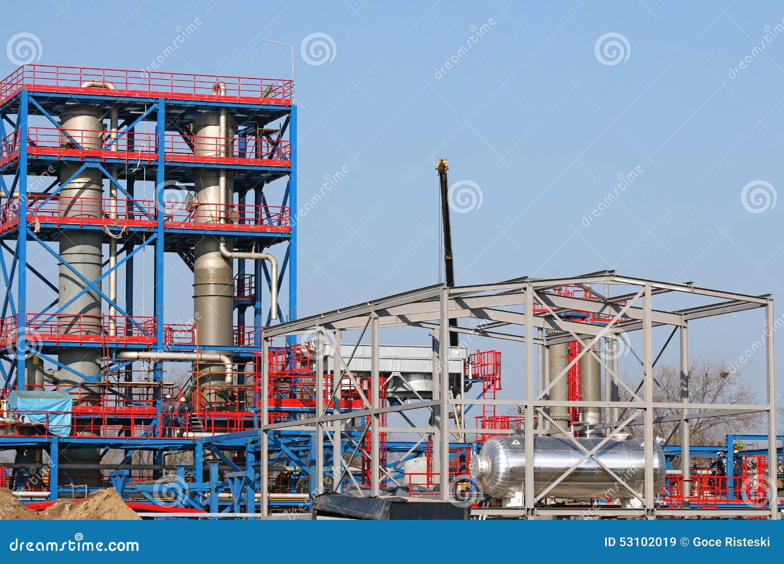 Workers on new petrochemical plant construction site