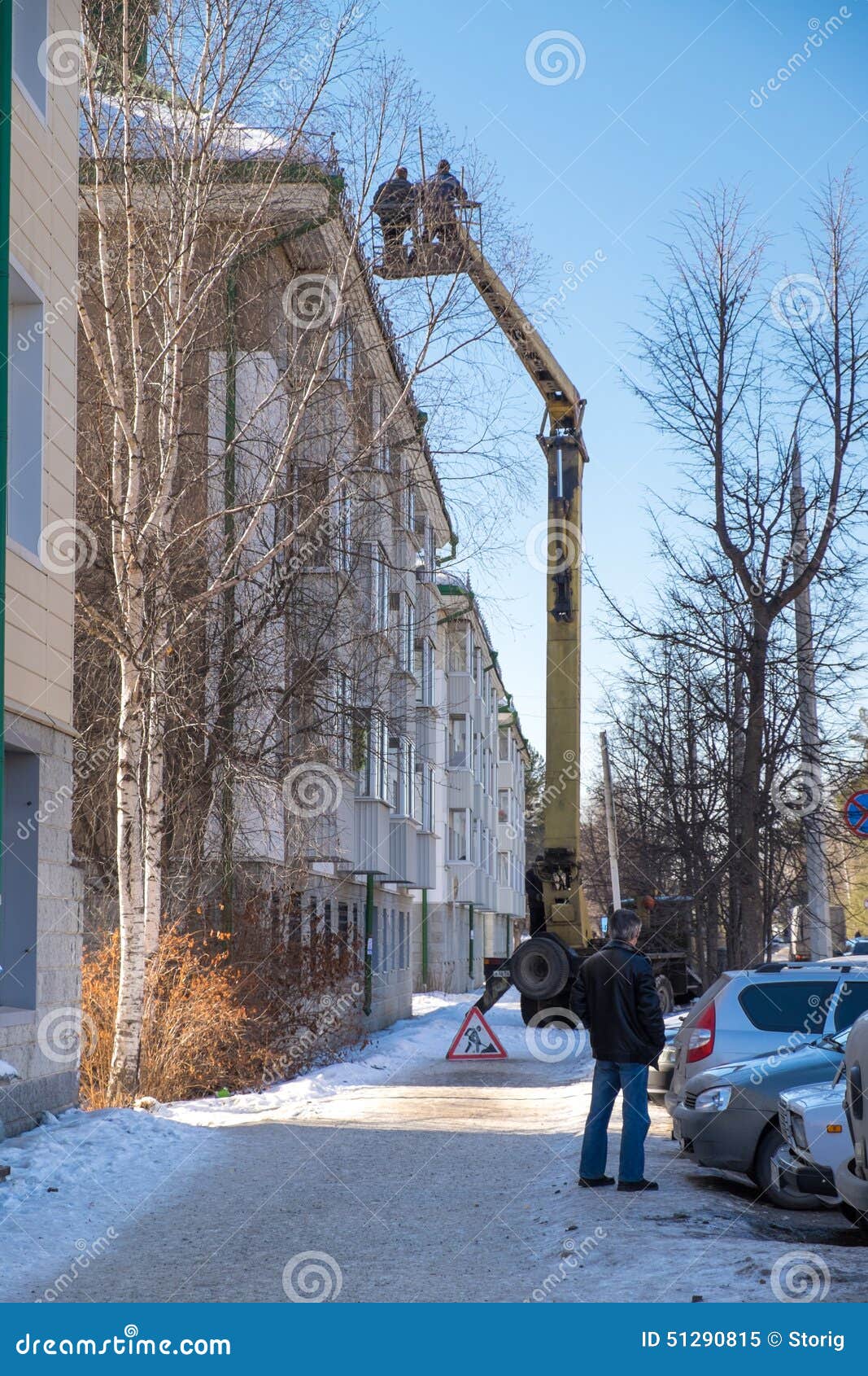 Workers Throw Off the Snow from the Roof. Editorial Image Image of