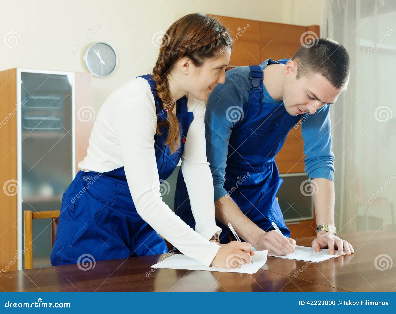 Workers in Uniform Filling in Questionnaire Stock Photo Image of