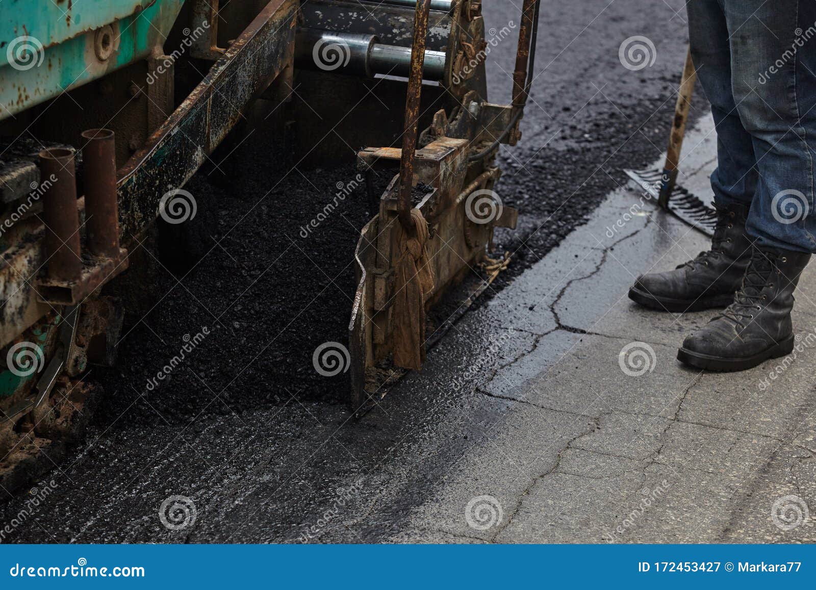 Workers Using Asphalt Tools during Road Construction Stock Image