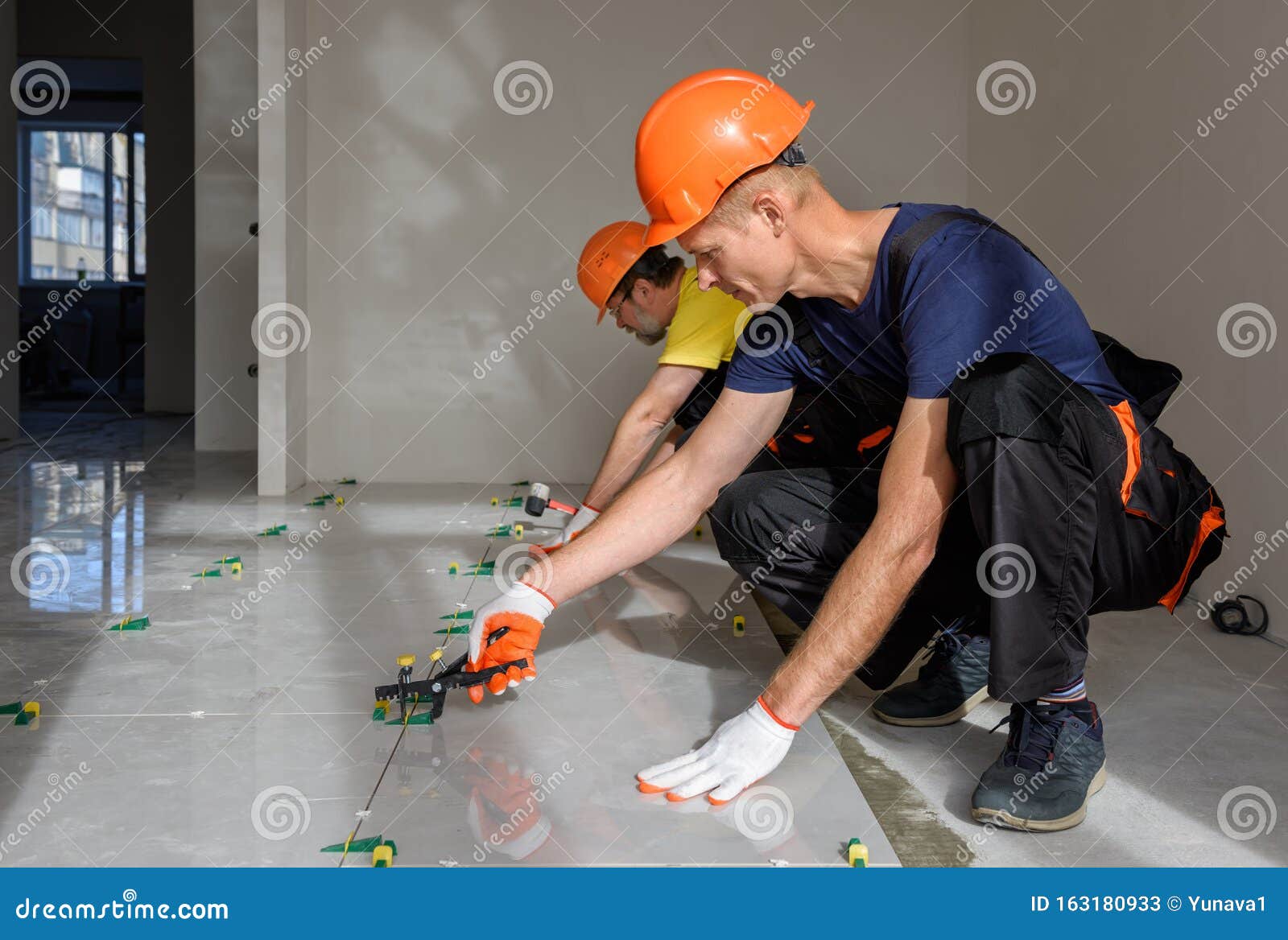 Installing a Large Ceramic Tile Stock Image Image of mallet, handyman 163180933