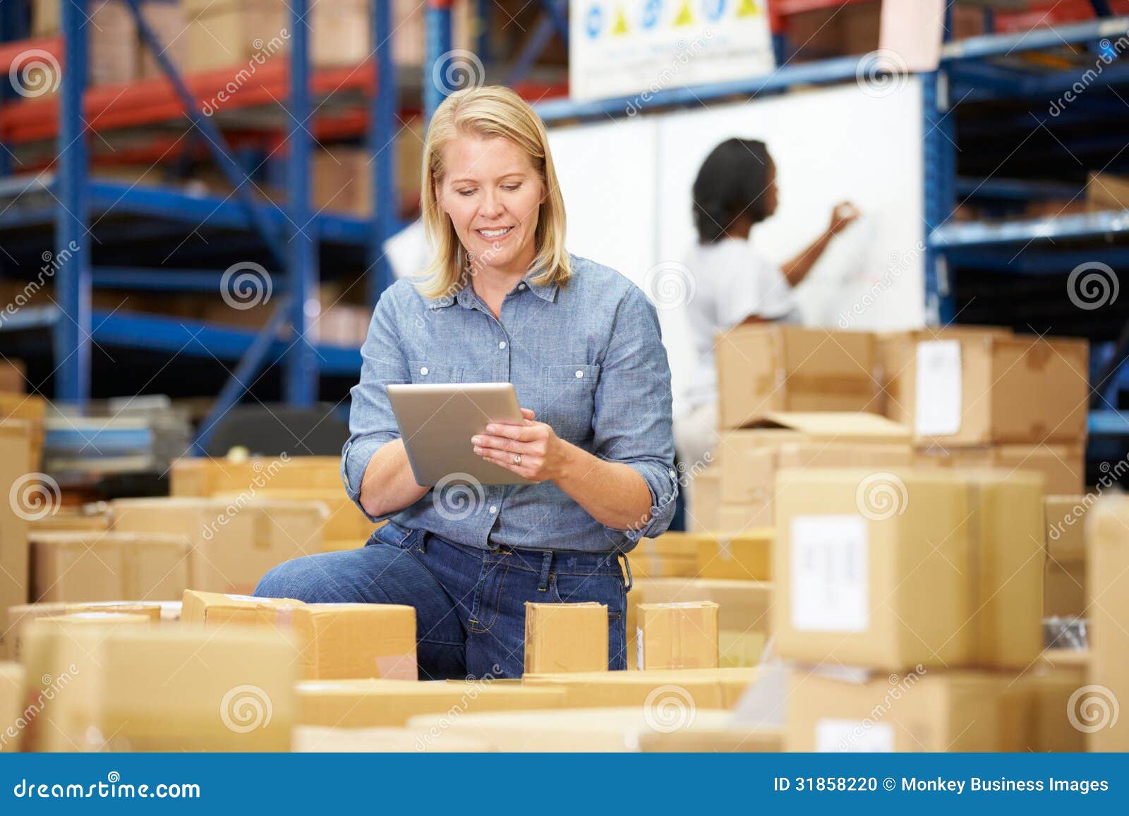 Workers in Warehouse Preparing Goods for Dispatch Stock Photo Image
