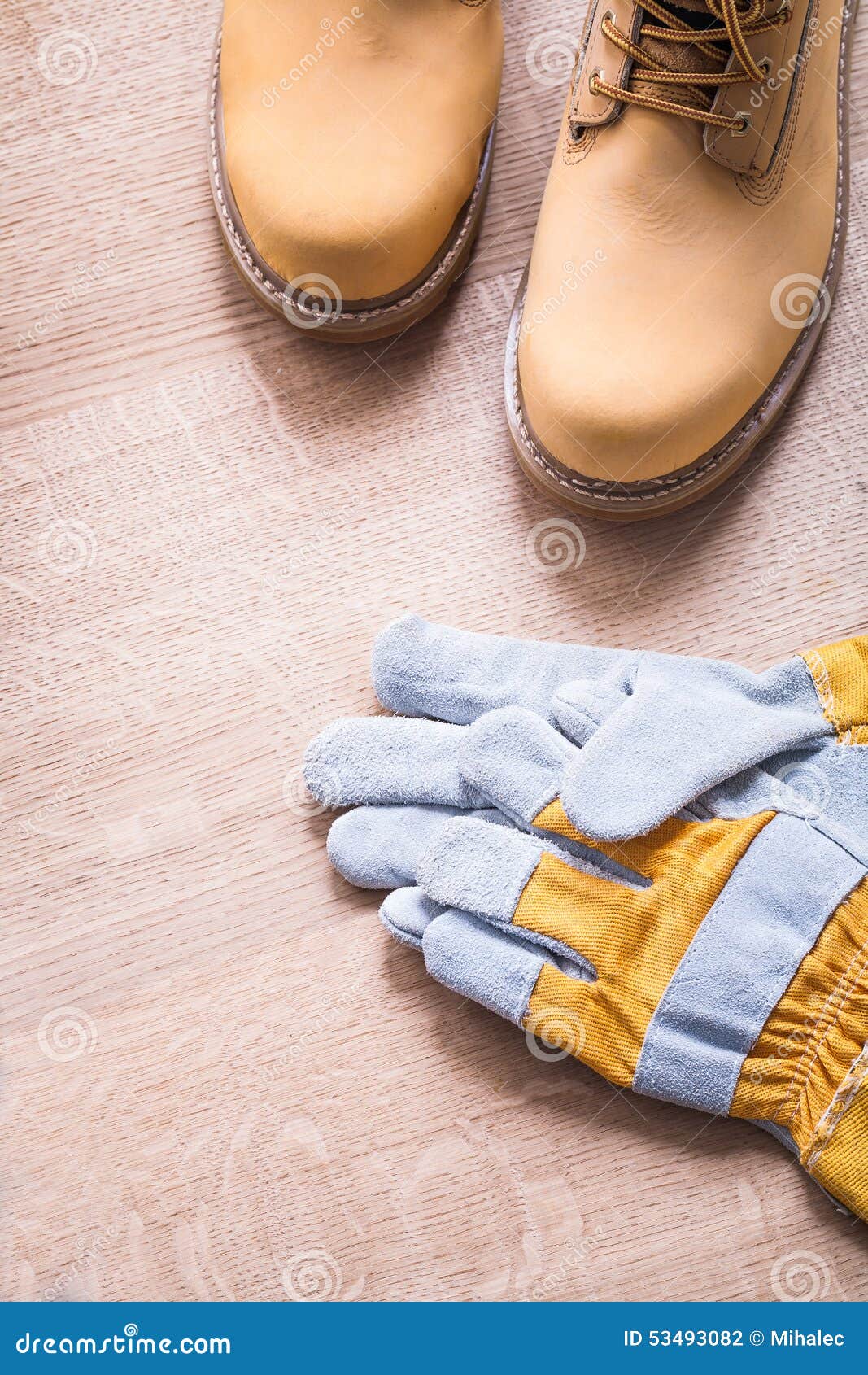 Working Boots and Protective Gloves on Wooden Stock Photo Image of