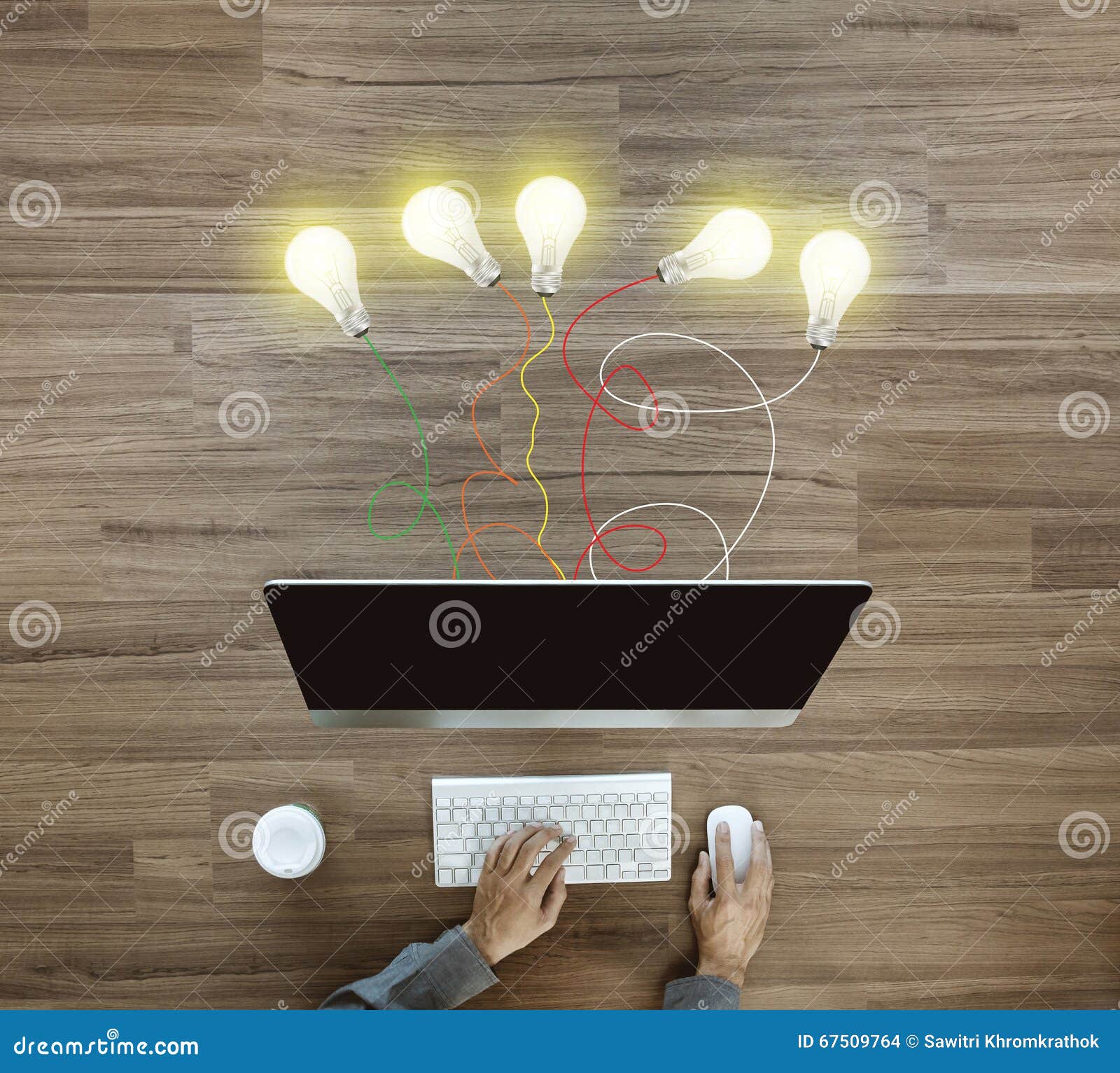 Working On Desktop Computer With Creative Light Bulb Ideas Stock
