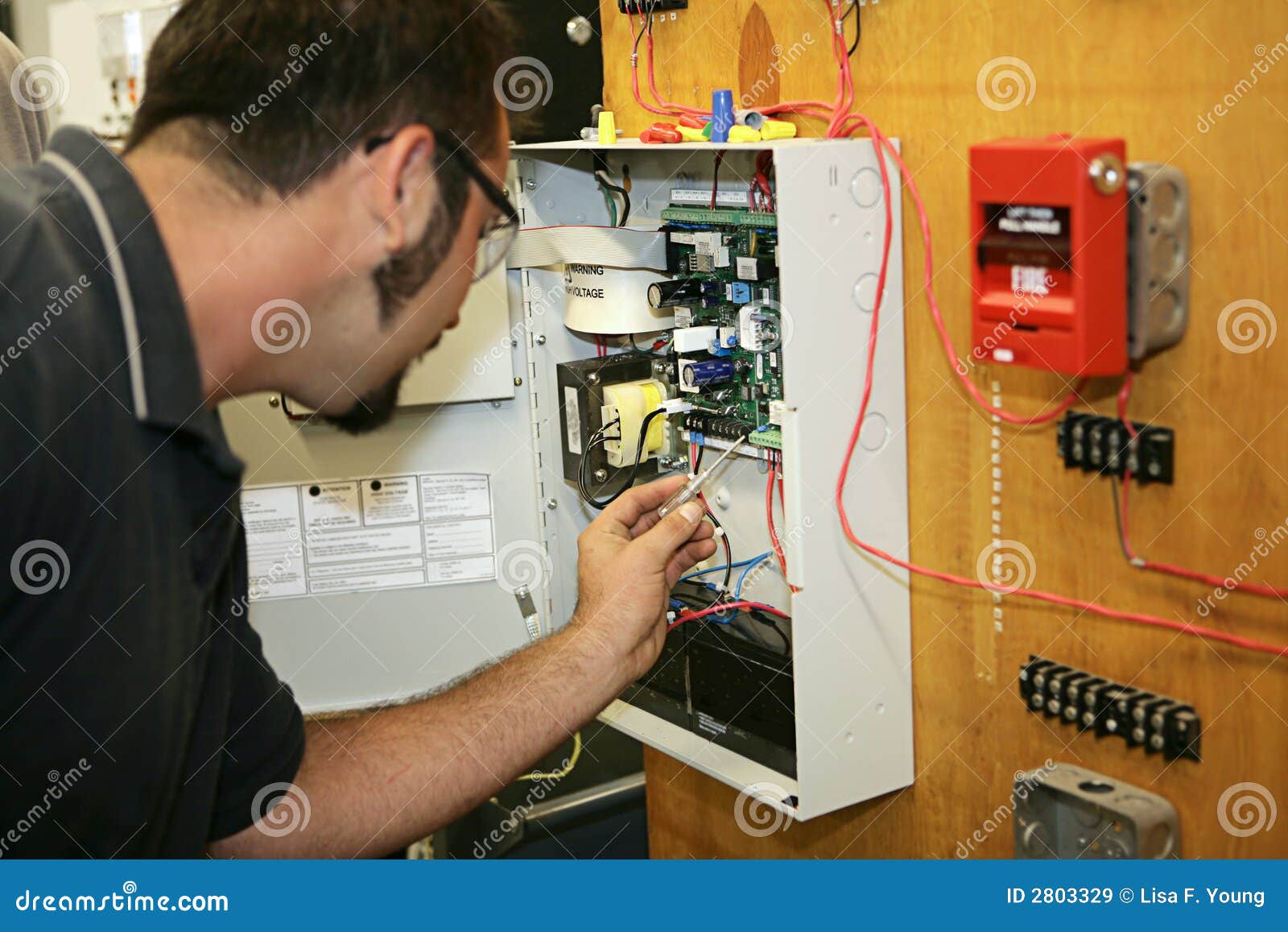 Working on Fire Alarm stock image. Image of board, power 2803329