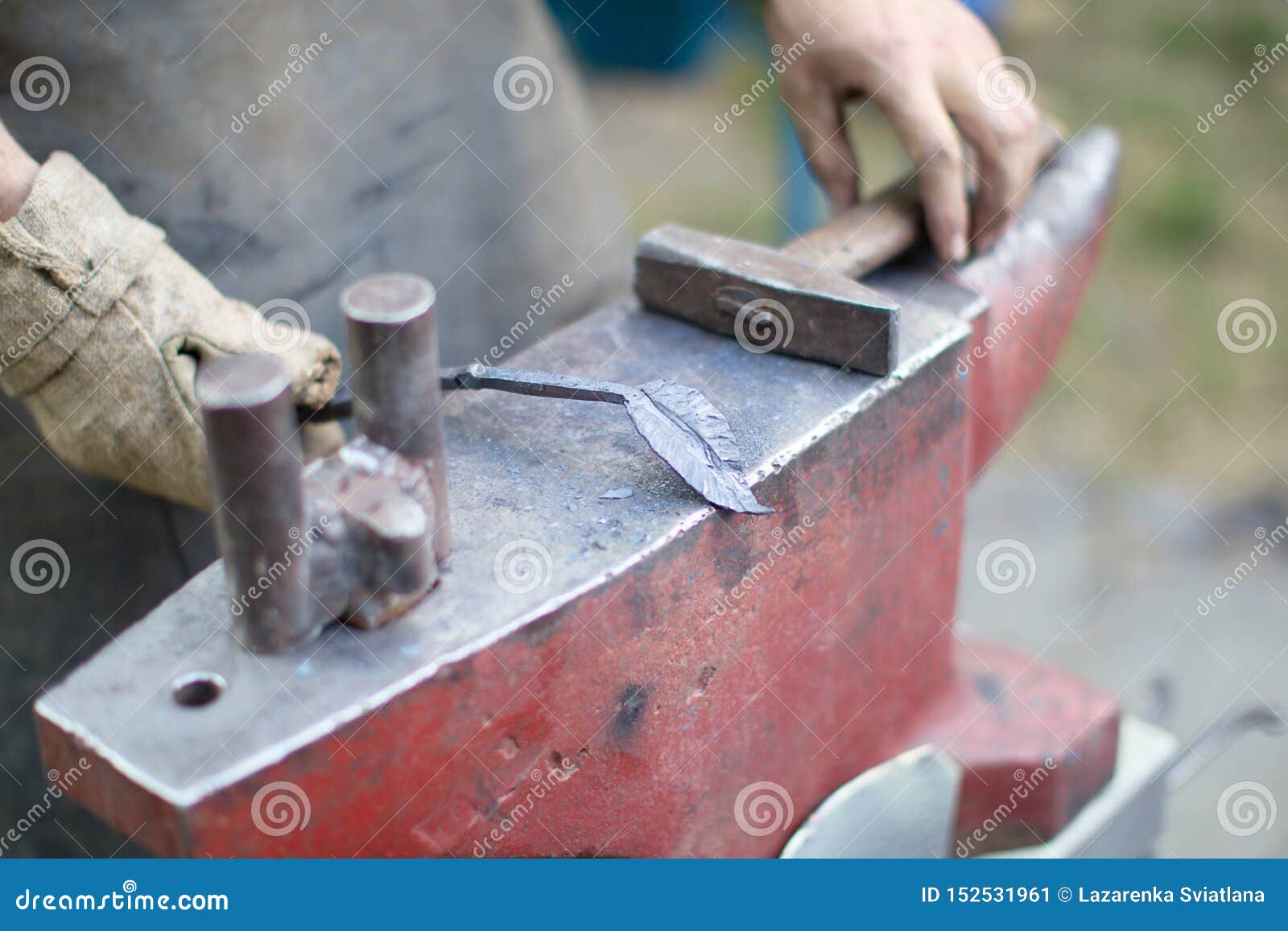 Working Hands with a Hammer Iron. Stock Image Image of hammer