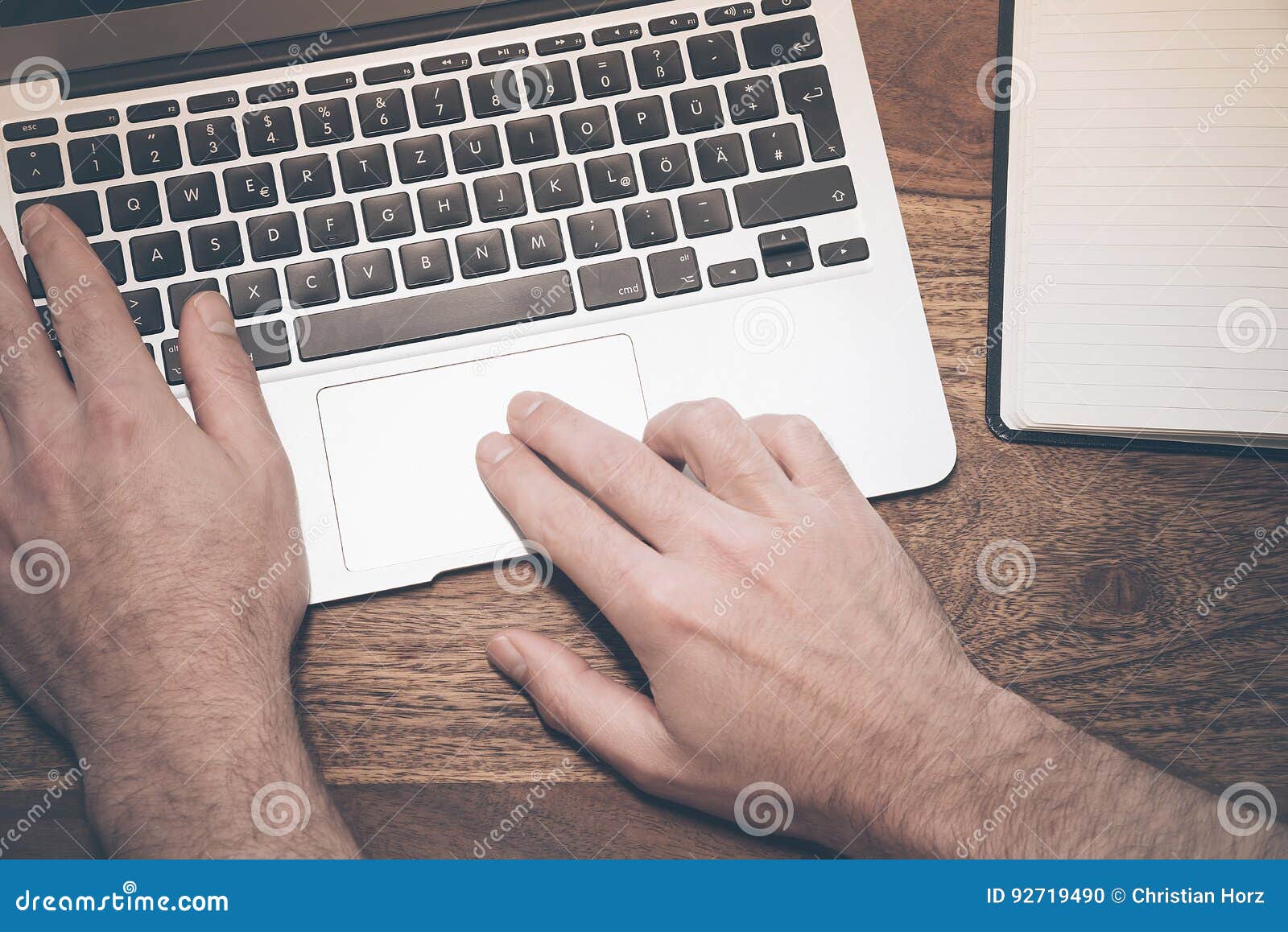 working on a notebook computer