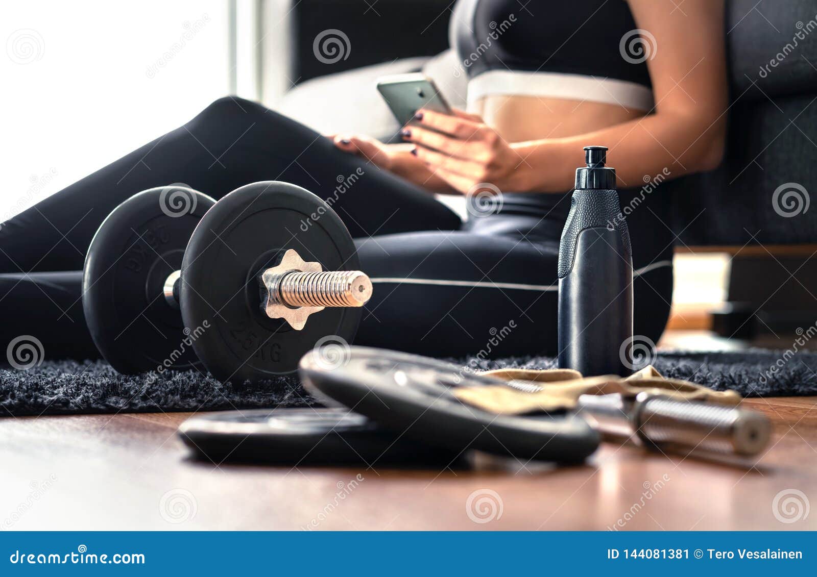 working out at home with online fitness course, workout video or personal trainer service in phone. health or sport mobile app.