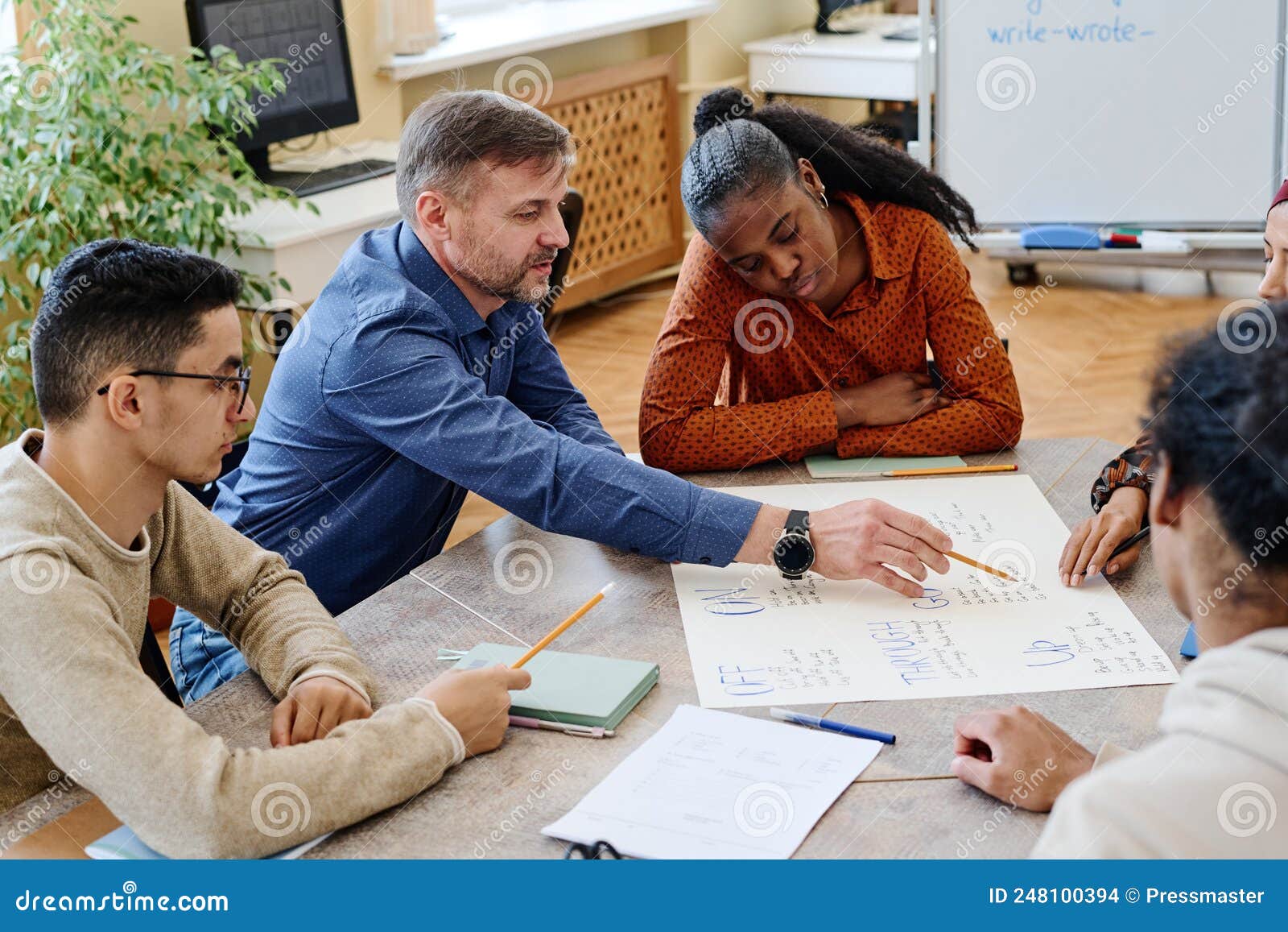 Working on Poster Together stock photo. Image of culture - 248100394
