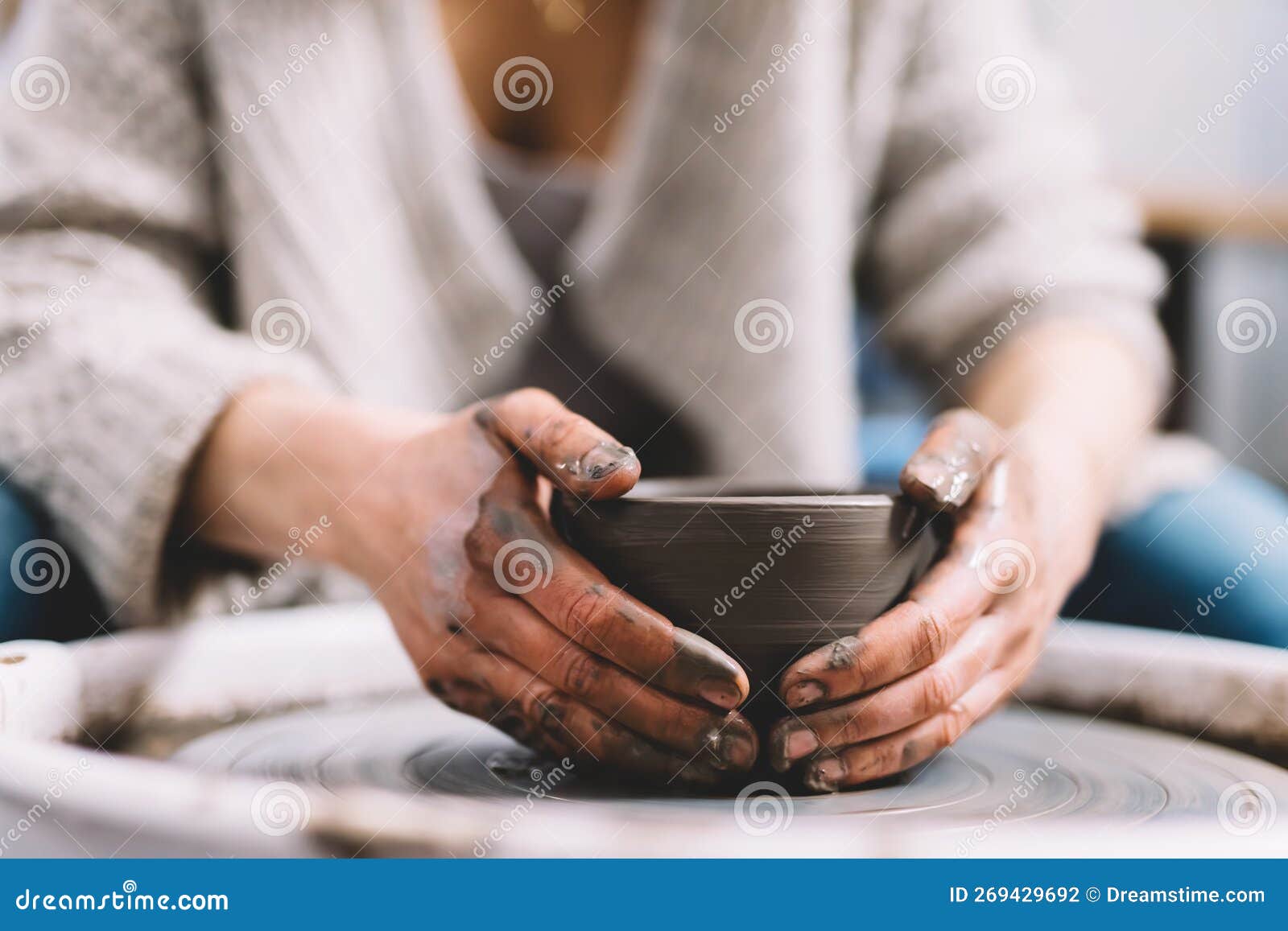 Working on Pottery Wheel in Ceramics Creating Ceramic Ware