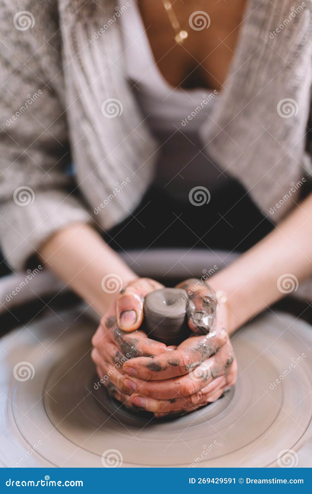 Working on Pottery Wheel in Ceramics Creating Ceramic Ware