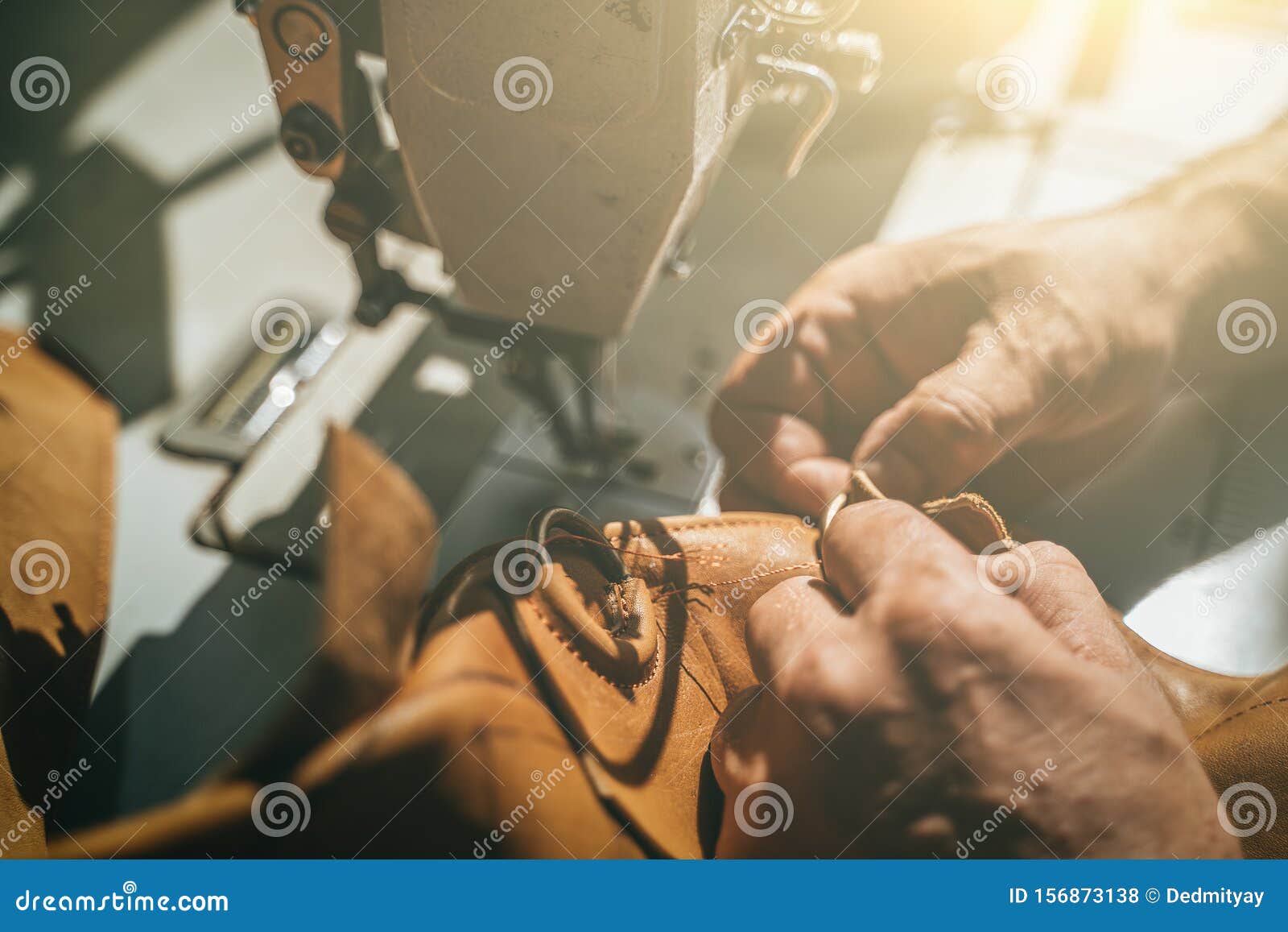 Working Process of Leather Craftsman. Tanner or Skinner Sews Leather on
