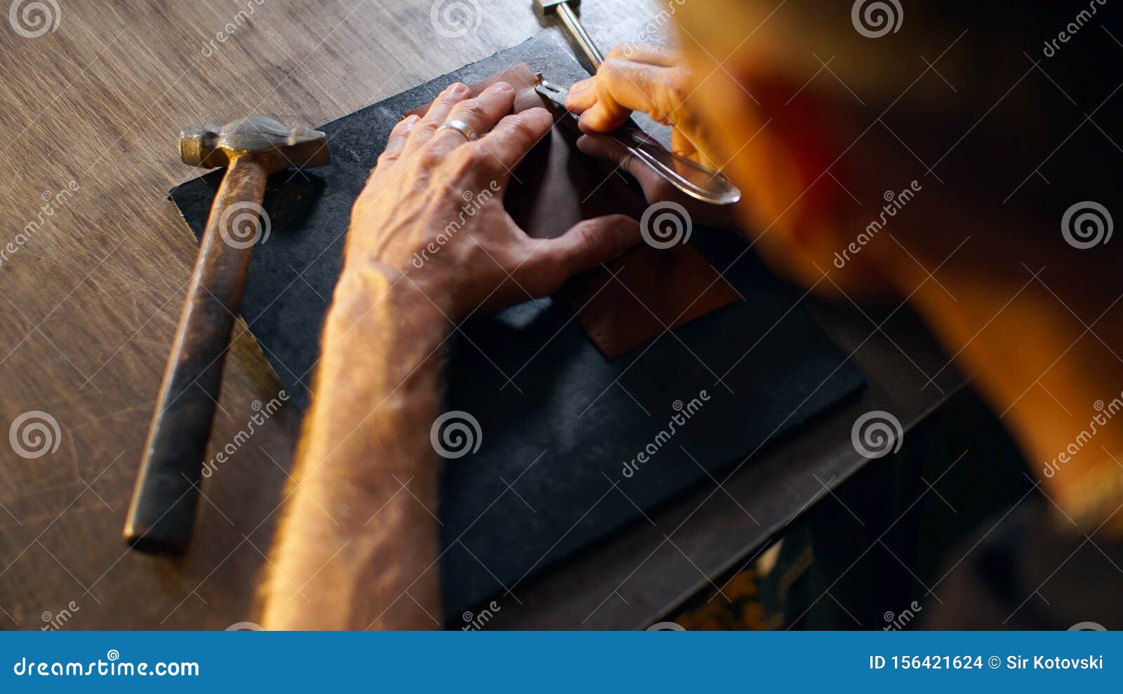 Leathercrafter Holding Crafting Tool and Working Stock Photo Image of