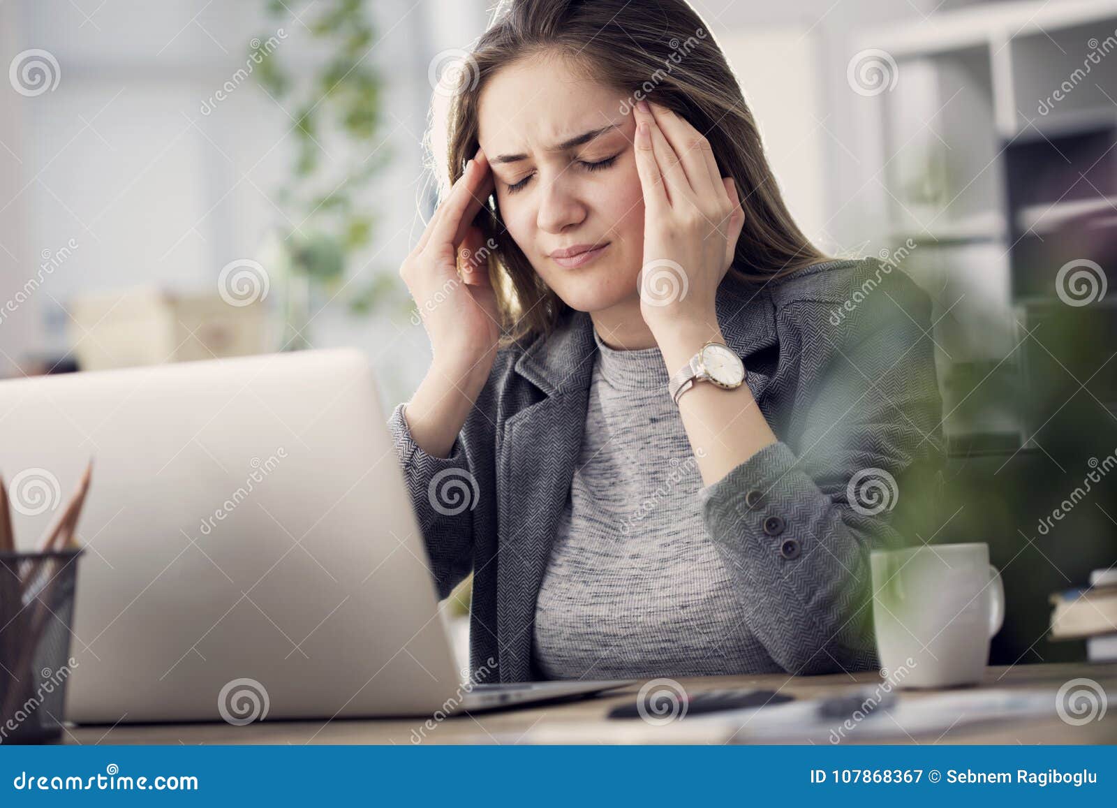 working woman have a headache