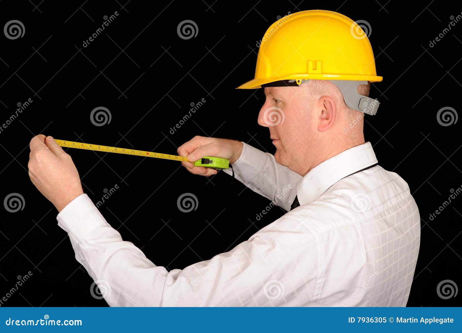 workman with tape measure