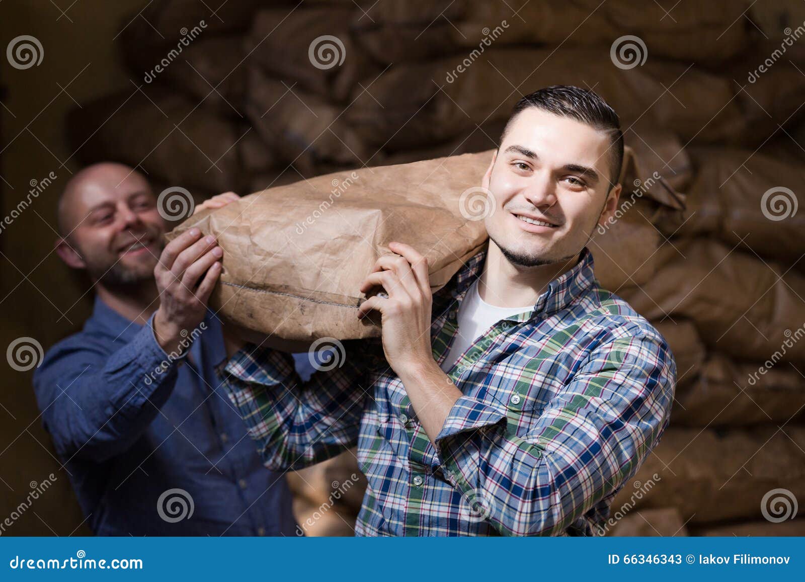 Workmen Unloading Shed with Coal Bags Stock Image Image of sandbags