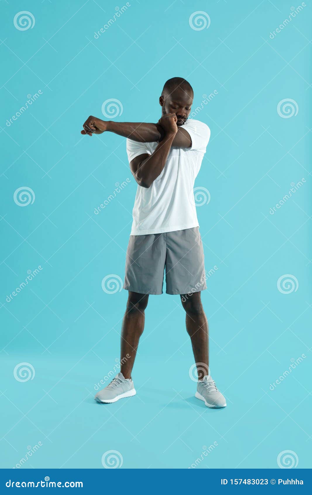 Workout. Man Stretching Arm, Warming Up on Blue Background Stock Image -  Image of stretch, sportswear: 157483023