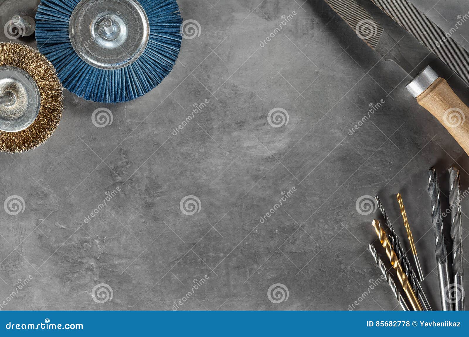 Workplace on a Concrete with Drill Bit, Tools, Grinding Discs Stock