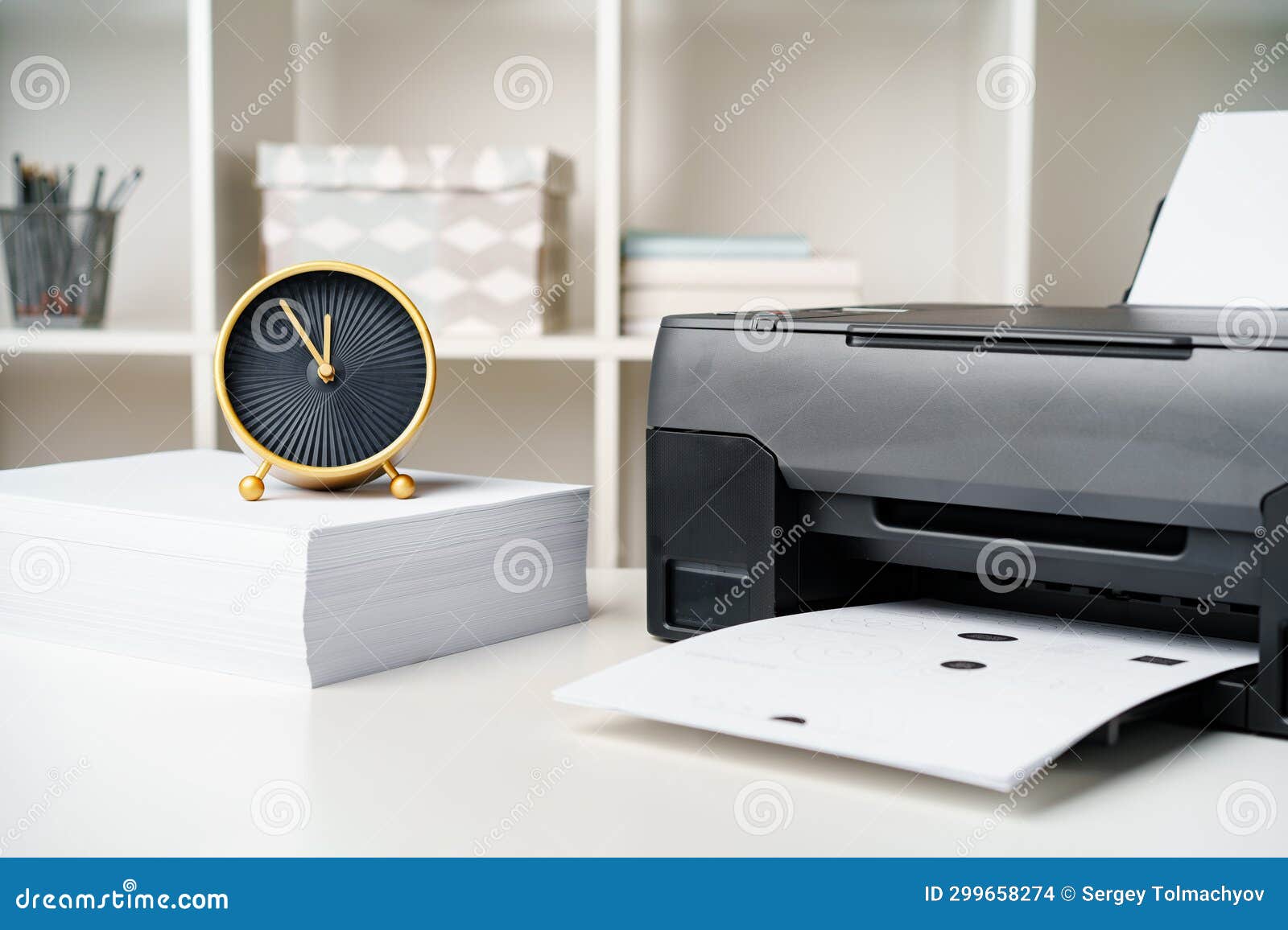 Workplace with Modern Printer and Clock in the Office Stock
