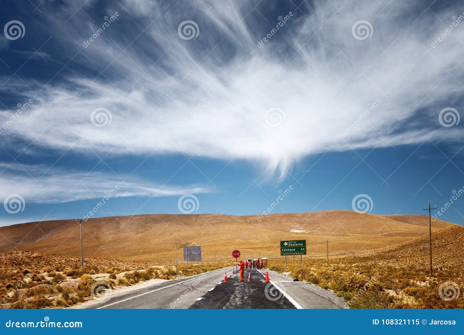 works on the road before arriving at the valley of happiness near cariquima and colchane in the tarapaca region, chile