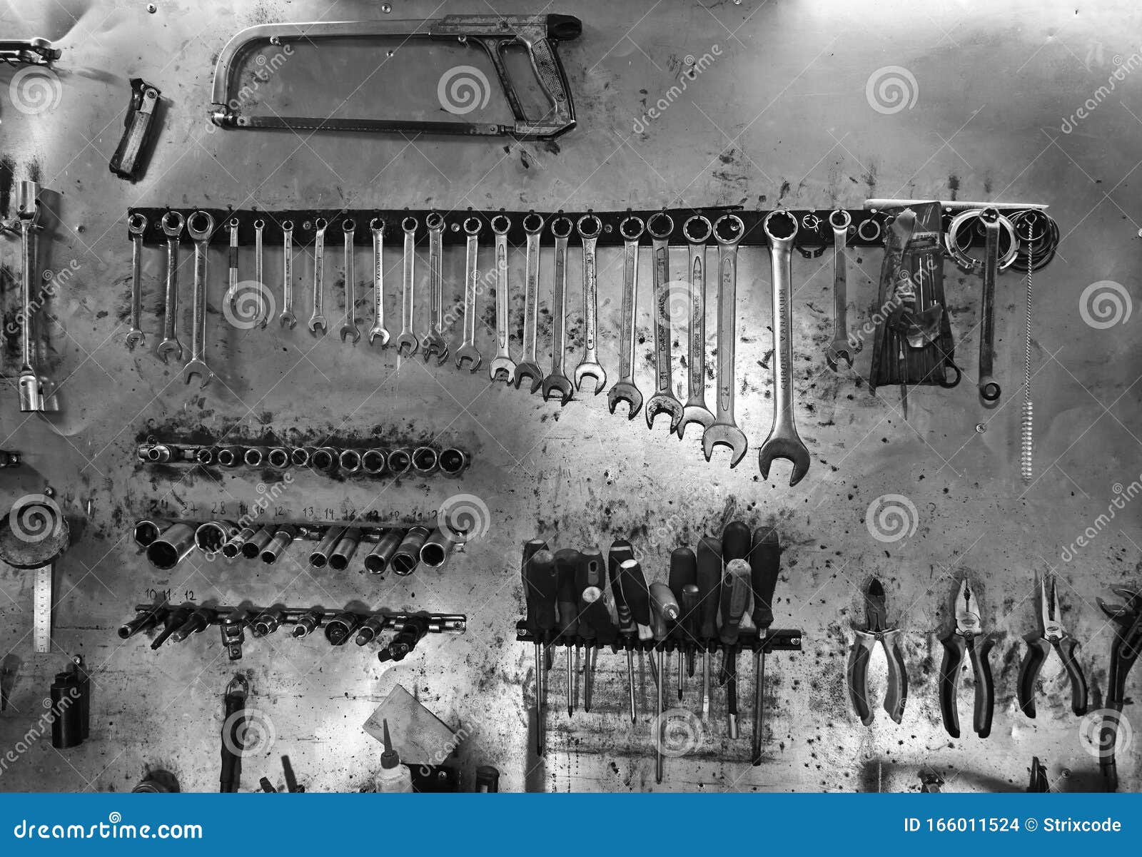 workshop scene. image of old tools hanging on wall in workshop