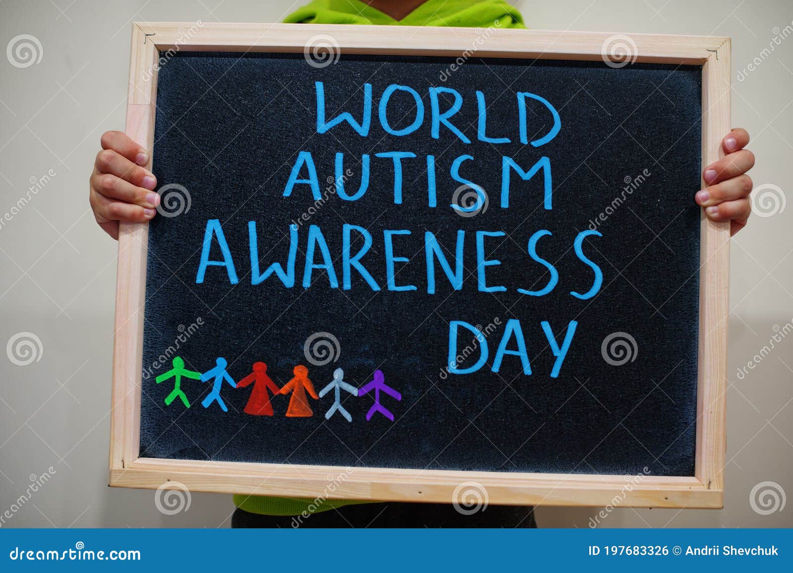 World Autism Awareness Day Boy Hold Chalkboard With Blue Inscription