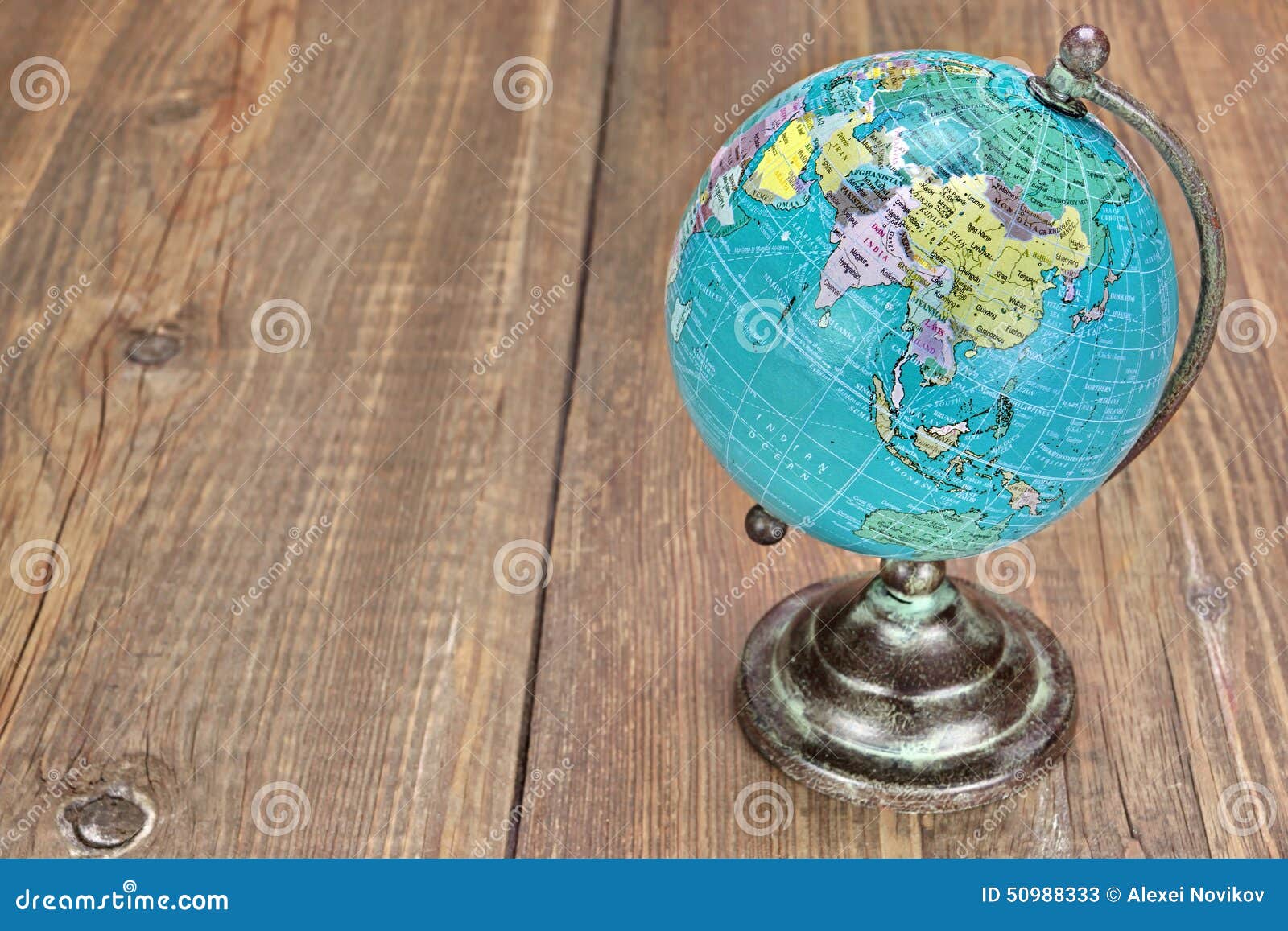 world geographical globe on the wooden table