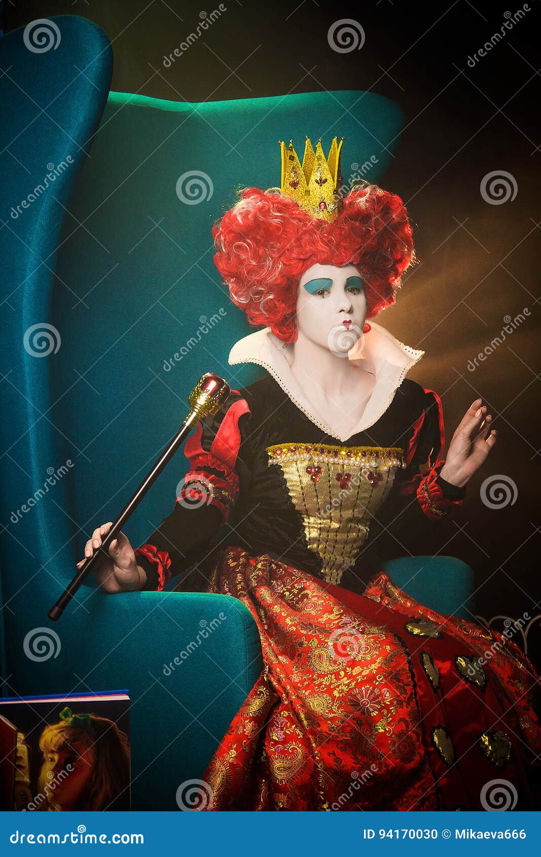 The Worm Queen Sits in a Chair Stock Photo - Image of background, girl ...