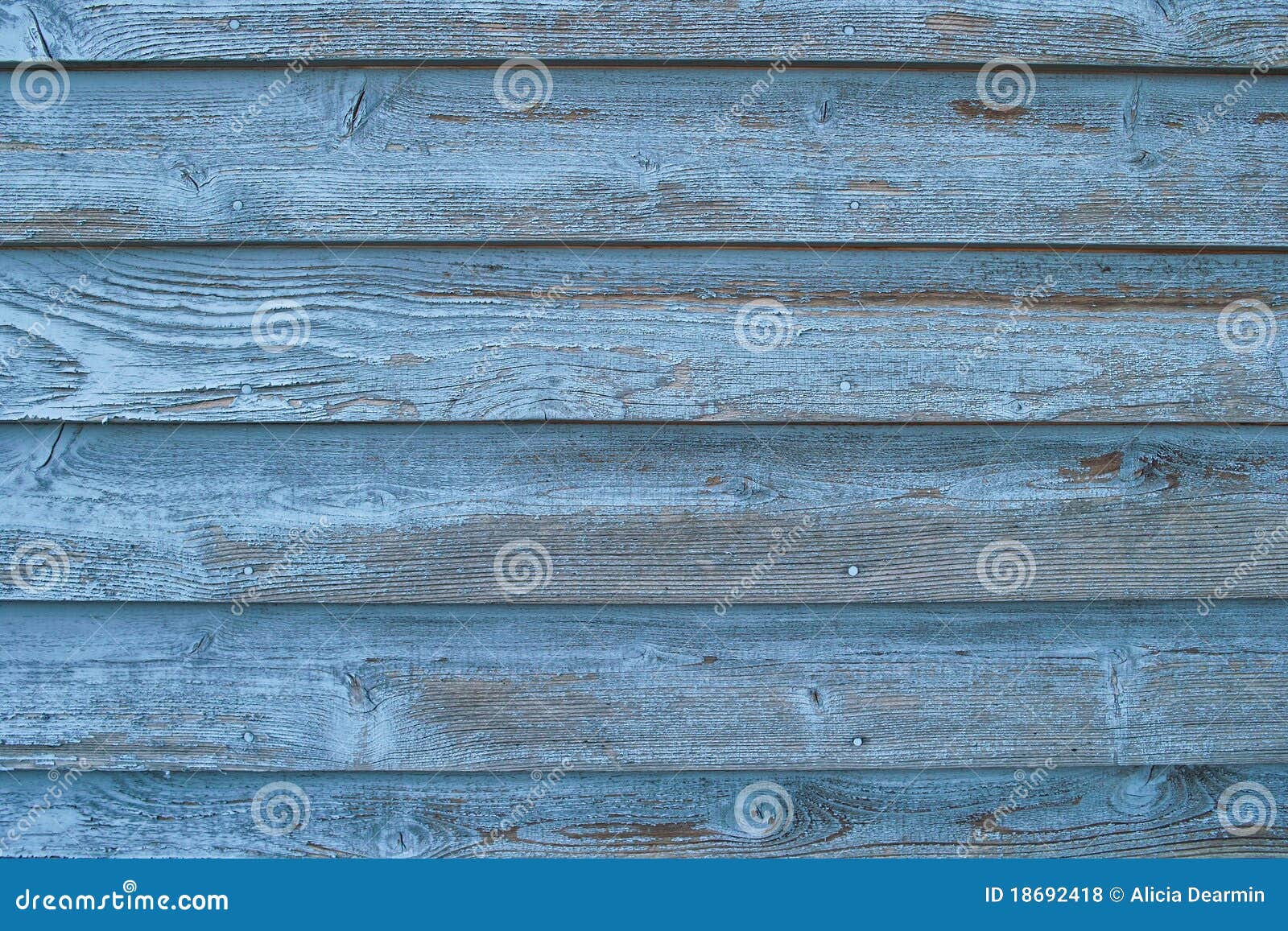 worn blue board siding