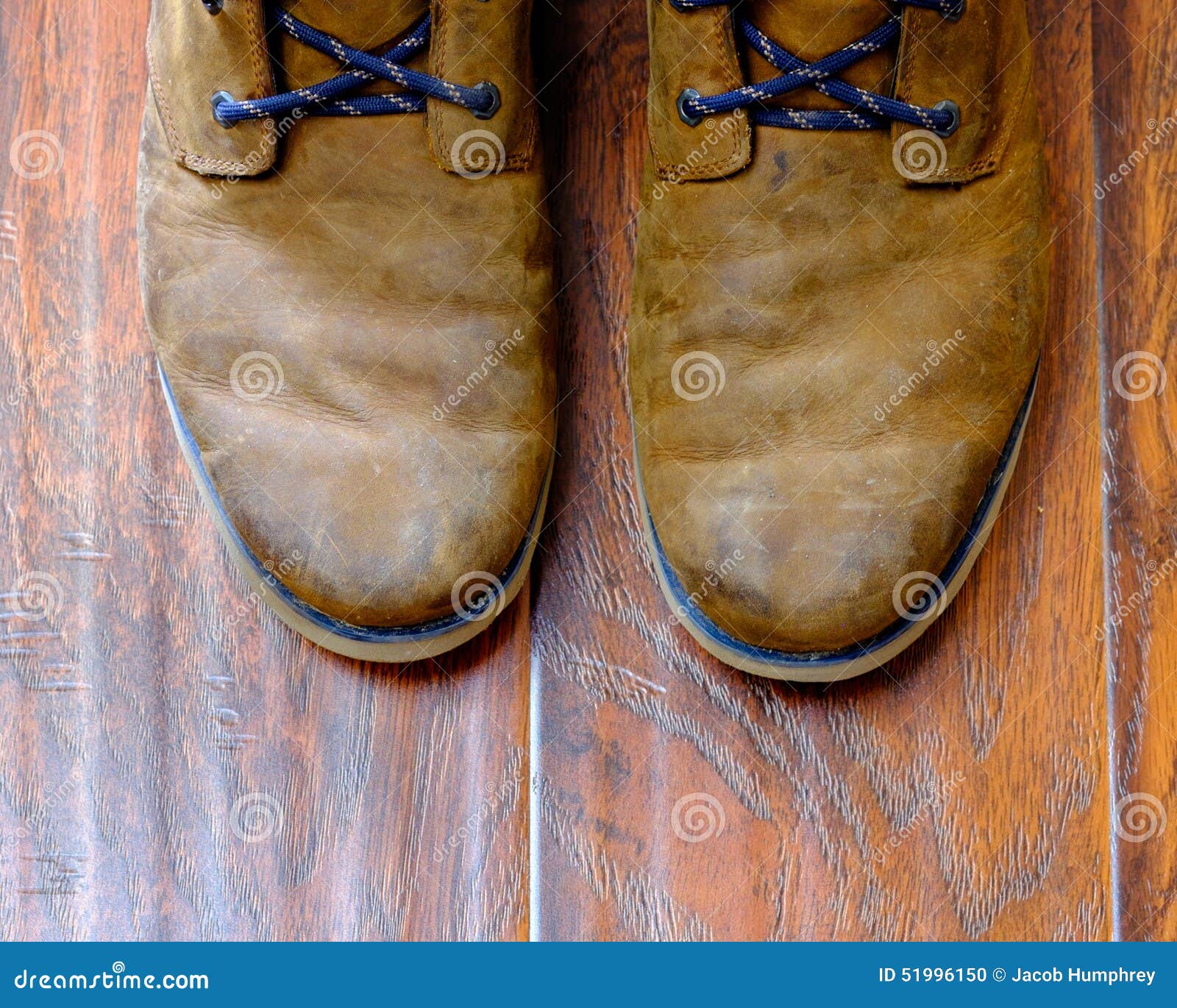 Worn Leather Boots on a Hardwood Floor Stock Photo - Image of male ...