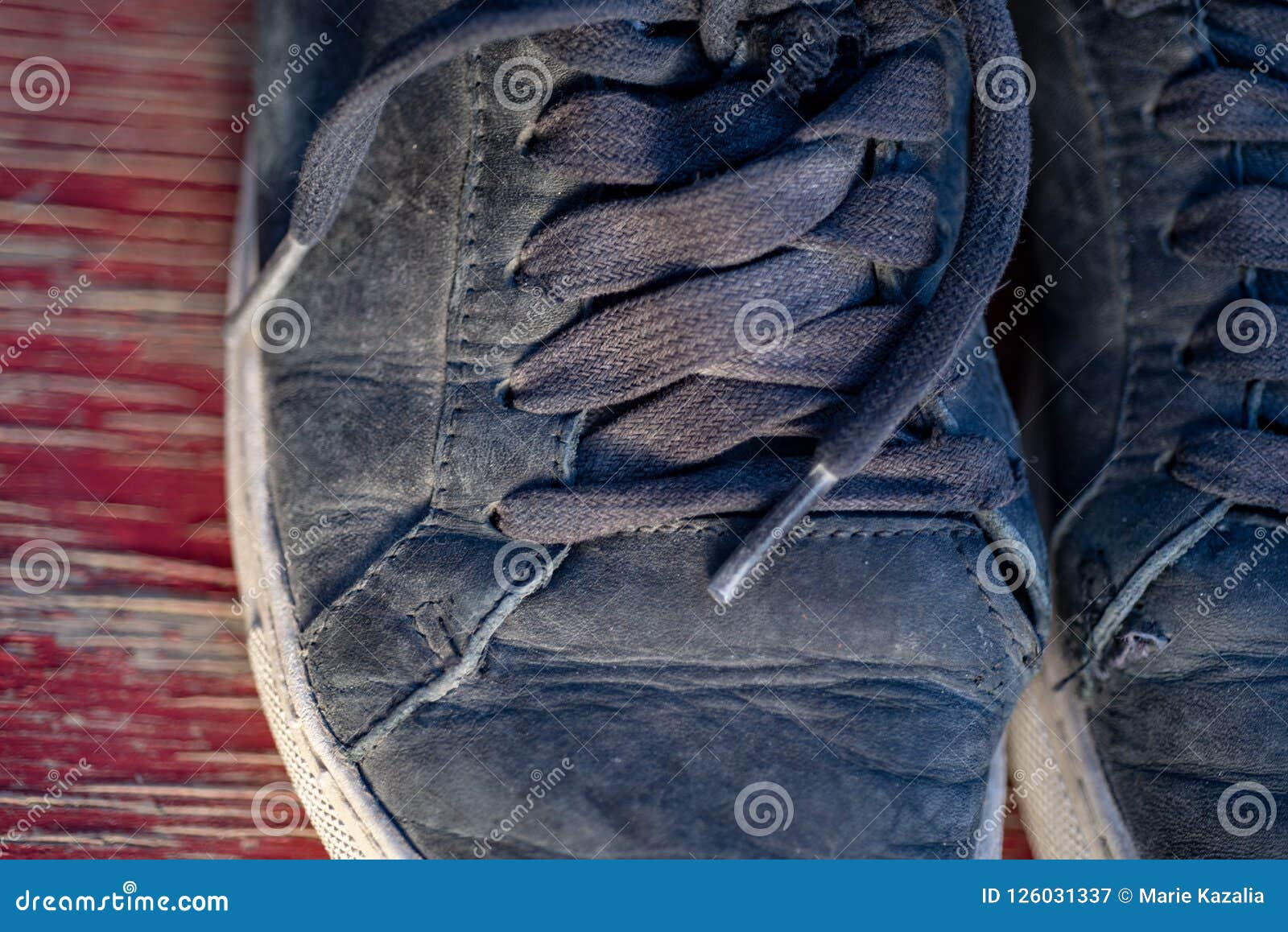 Worn Tennis Shoes and White Socks in Early Morning Sunlight after ...