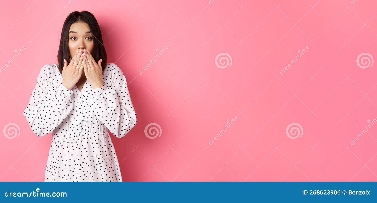 Worried Asian Girl In Dress Looking Concerned Cover Mouth And Gasping Staring At Camera