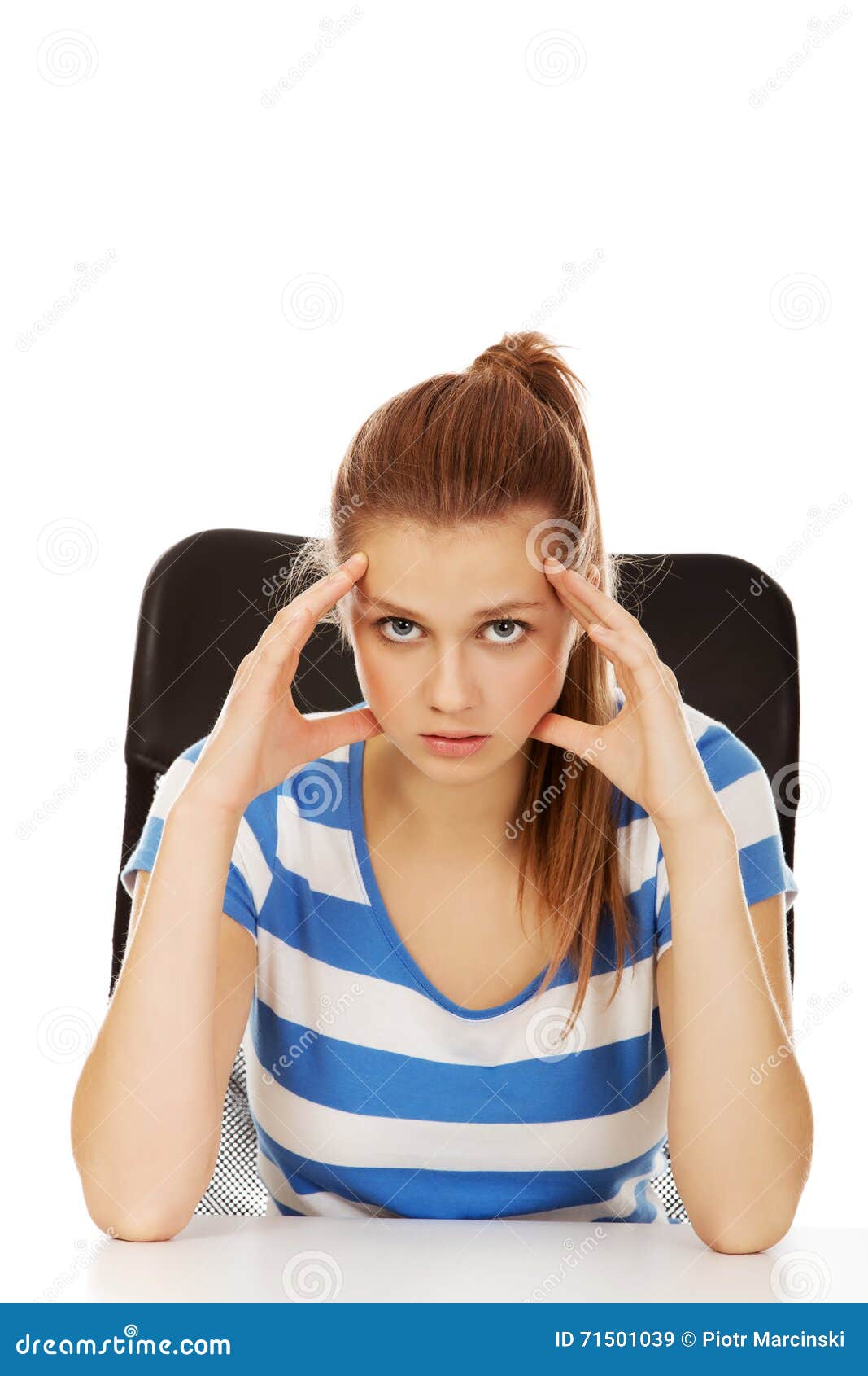 Worried Teenage Woman Sitting Behind Desk Stock Image - Image of casual ...
