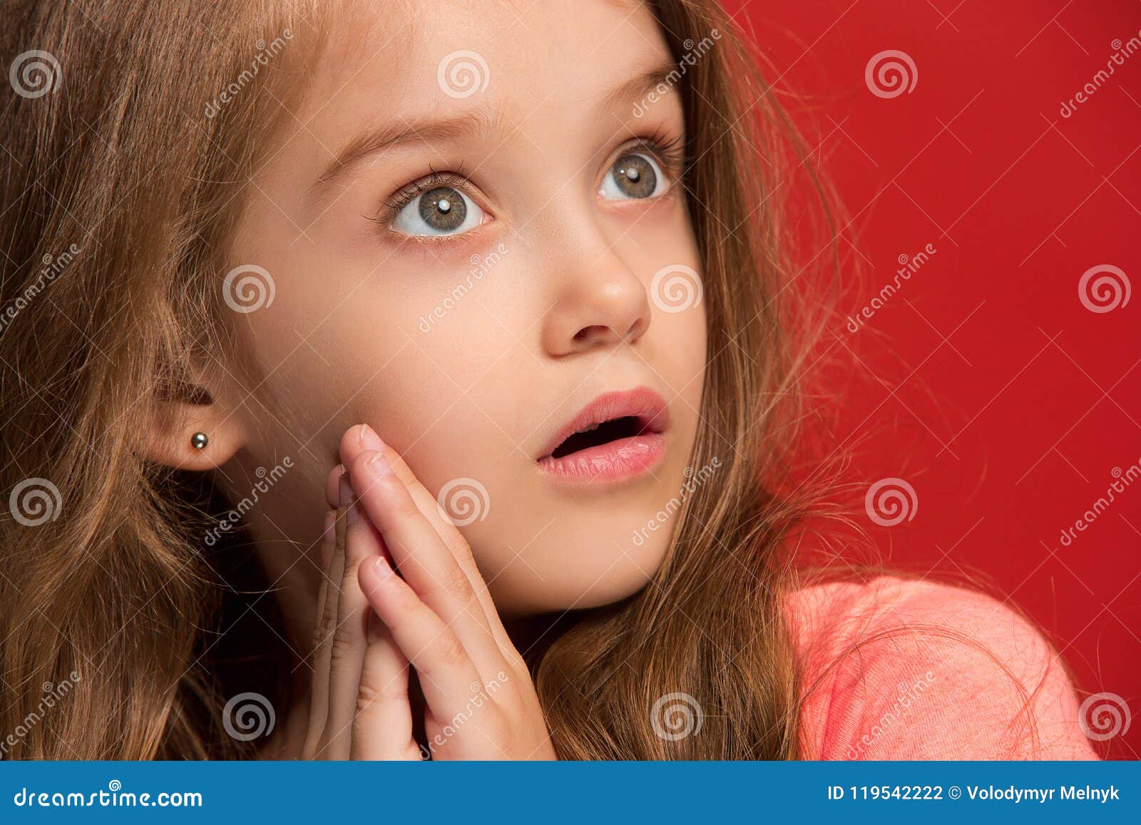 Beautiful Teen Girl Looking Suprised On Red Stock Photo Image Of